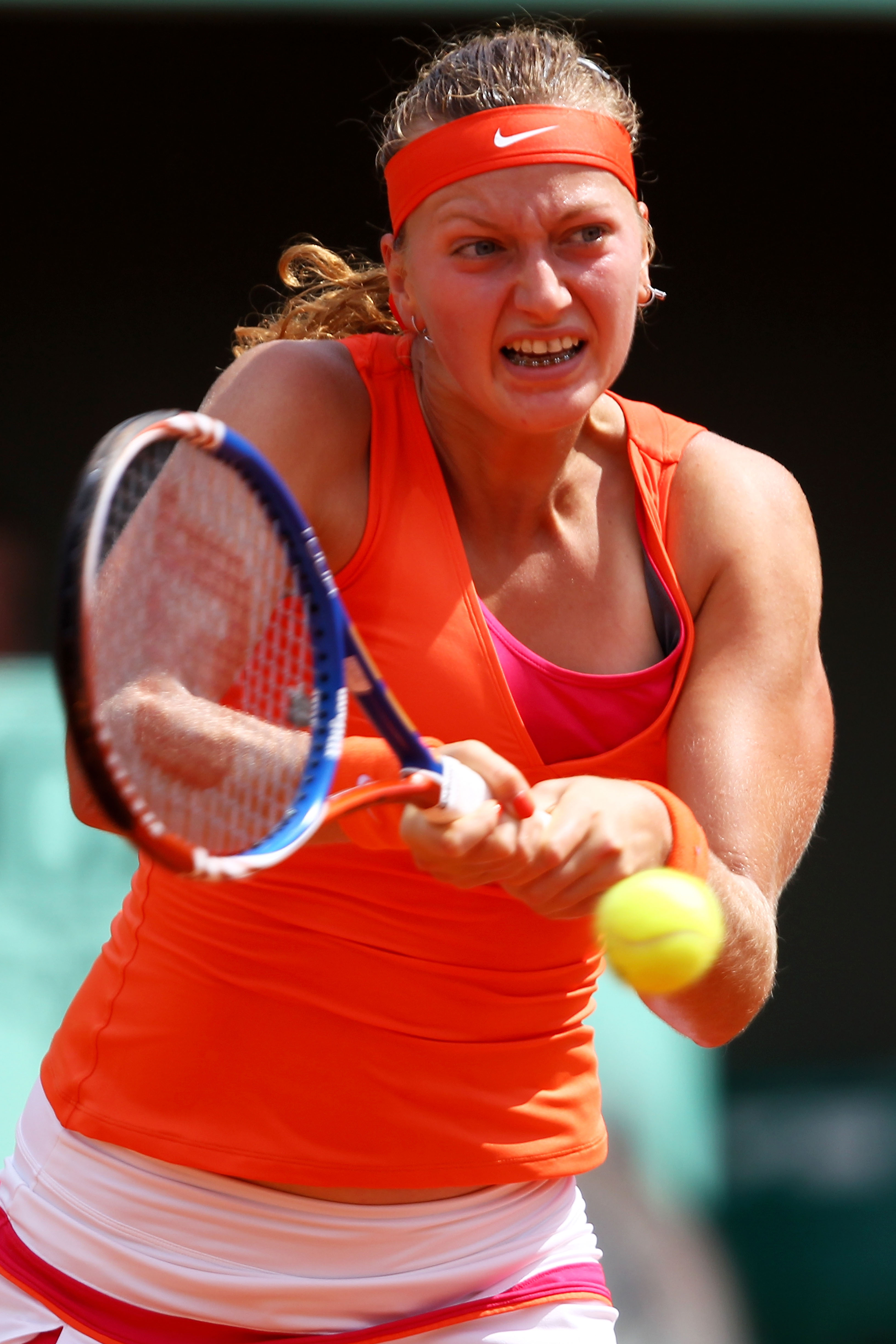 PARIS, FRANCE - MAY 30:  Petra Kvitova of Czech Republic hits a backhand during the women's singles round four match between Na Li of China and Petra Kvitova of Czech Republic on day nine of the French Open at Roland Garros on May 30, 2011 in Paris, Franc