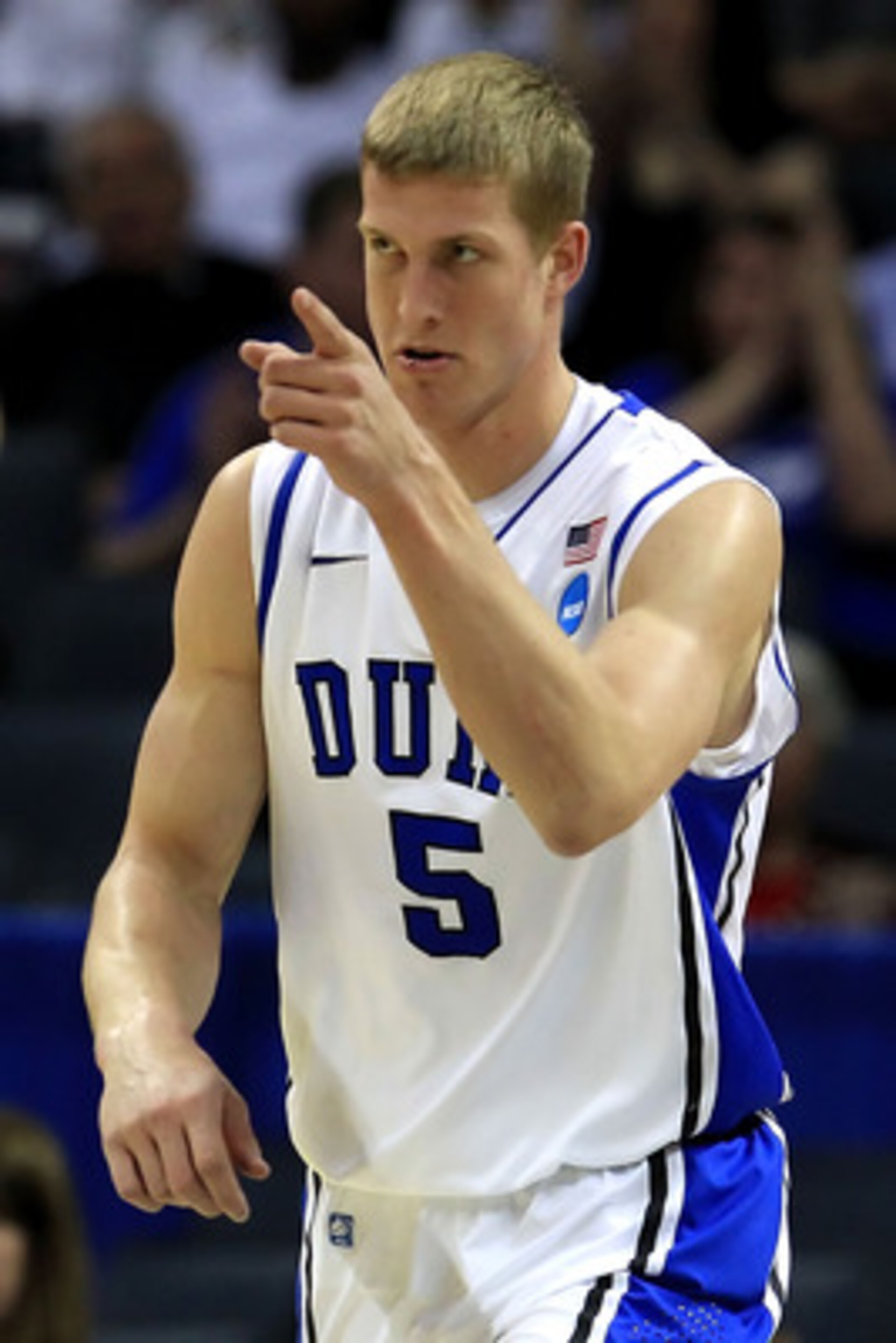 CHARLOTTE, NC - MARCH 18:  Mason Plumlee #5 of the Duke Blue Devils reacts in the first half while taking on the Hampton Pirates during the second round of the 2011 NCAA men's basketball tournament at Time Warner Cable Arena on March 18, 2011 in Charlotte