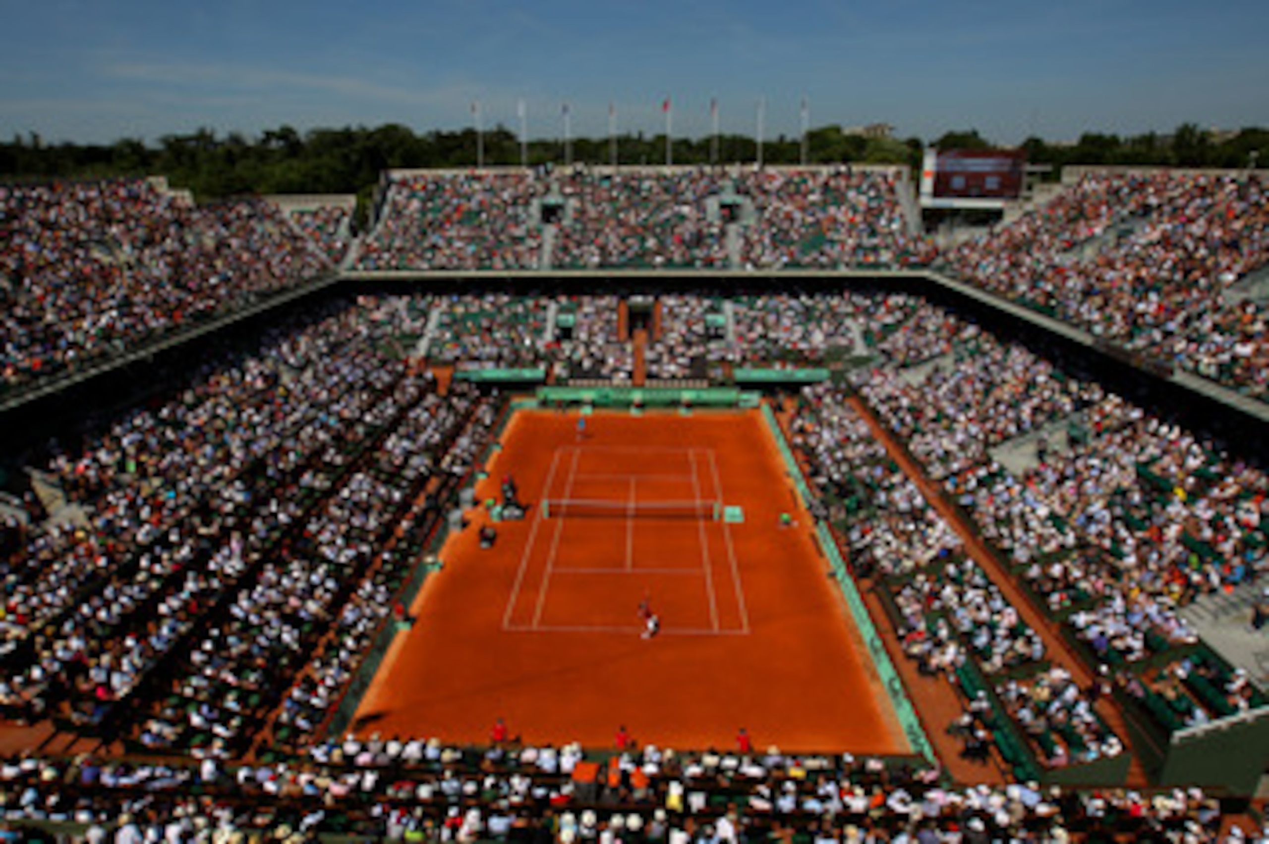 PARIS, FRANCE - MAY 23:  A general view of Court Phillippe Chatrier as Roger Federer of Switzerland serves during the men's singles first round match between Feliciano Lopez of Spain and Roger Federer of Switzerland on day two of the French Open at Roland