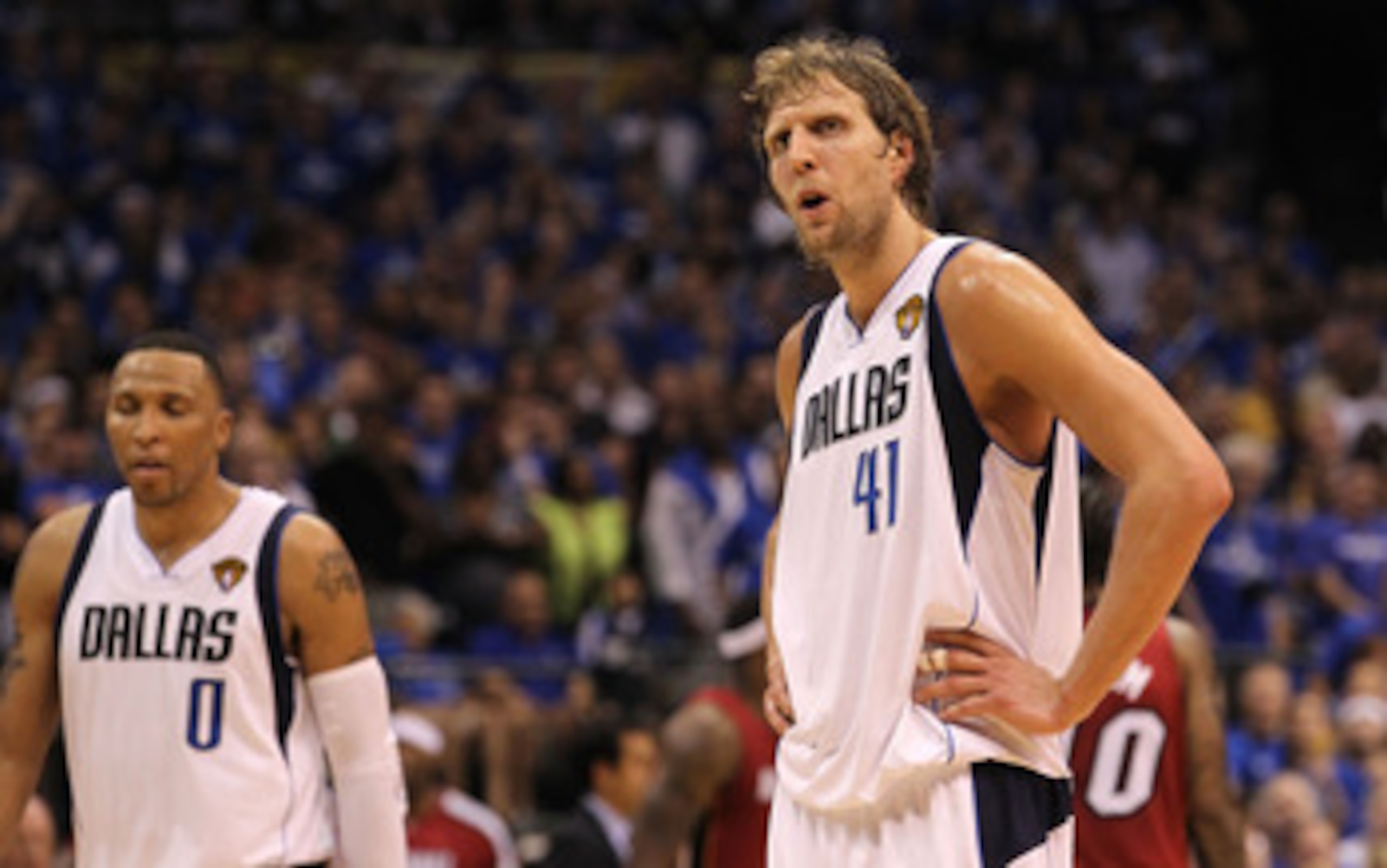 DALLAS, TX - JUNE 05:  (L-R) Shawn Marion #0 and Dirk Nowitzki #41 of the Dallas Mavericks look on while taking on the Miami Heat in Game Three of the 2011 NBA Finals at American Airlines Center on June 5, 2011 in Dallas, Texas. The Heat won 88-86. NOTE T