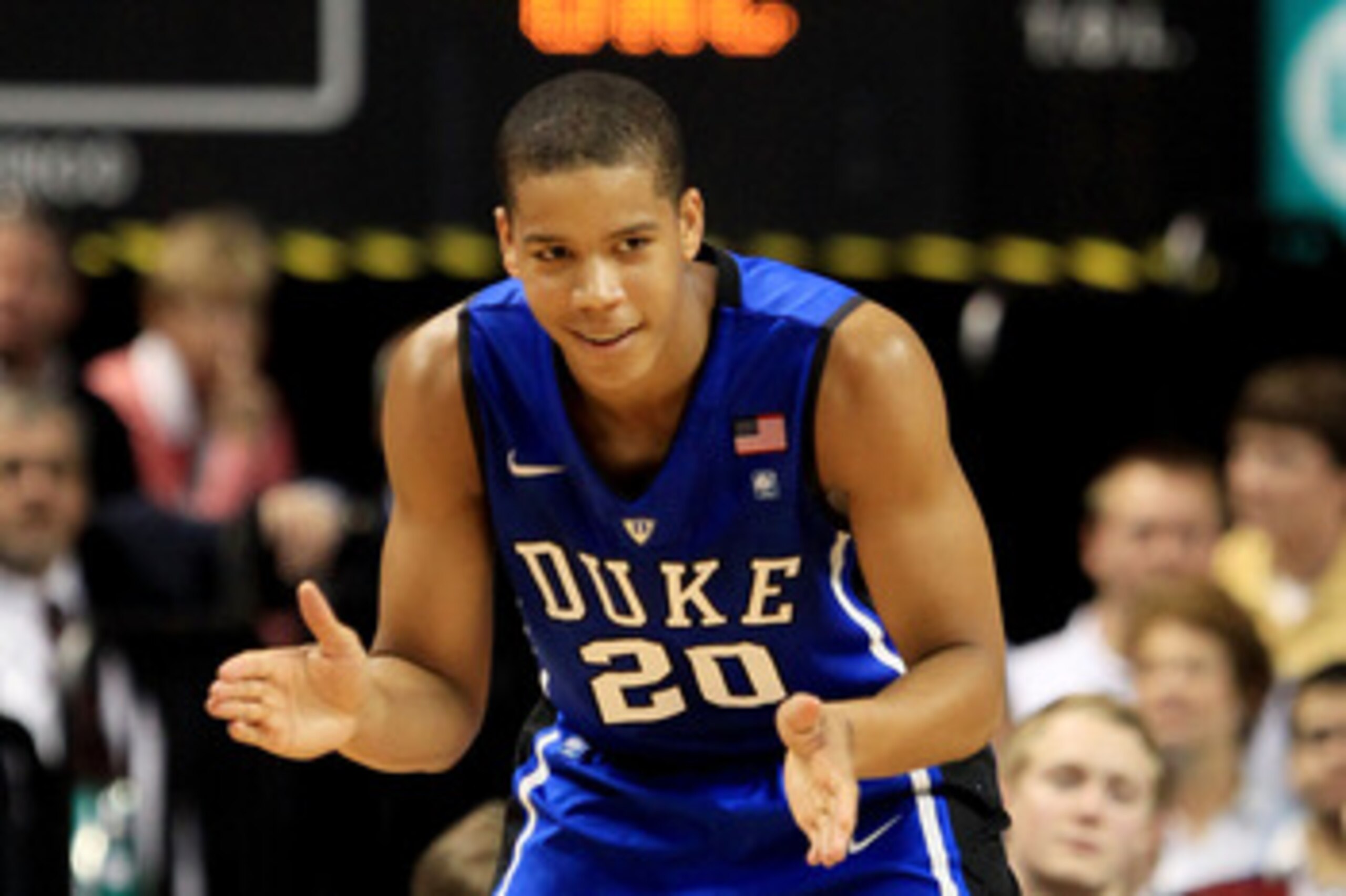 GREENSBORO, NC - MARCH 13:  Andre Dawkins #20 of the Duke Blue Devils claps while playing against the North Carolina Tar Heels during the first half in the championship game of the 2011 ACC men's basketball tournament at the Greensboro Coliseum on March 1