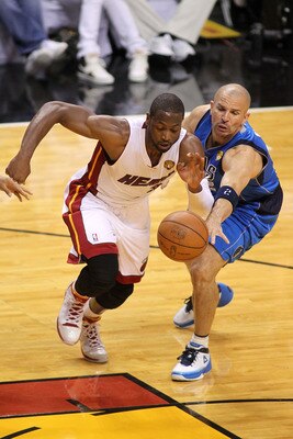 MIAMI, FL - JUNE 02:  Jason Kidd #2 of the Dallas Mavericks attempts to steal the ball from Dwyane Wade #3 of the Miami Heat in Game Two of the 2011 NBA Finals at American Airlines Arena on June 2, 2011 in Miami, Florida. NOTE TO USER: User expressly ackn