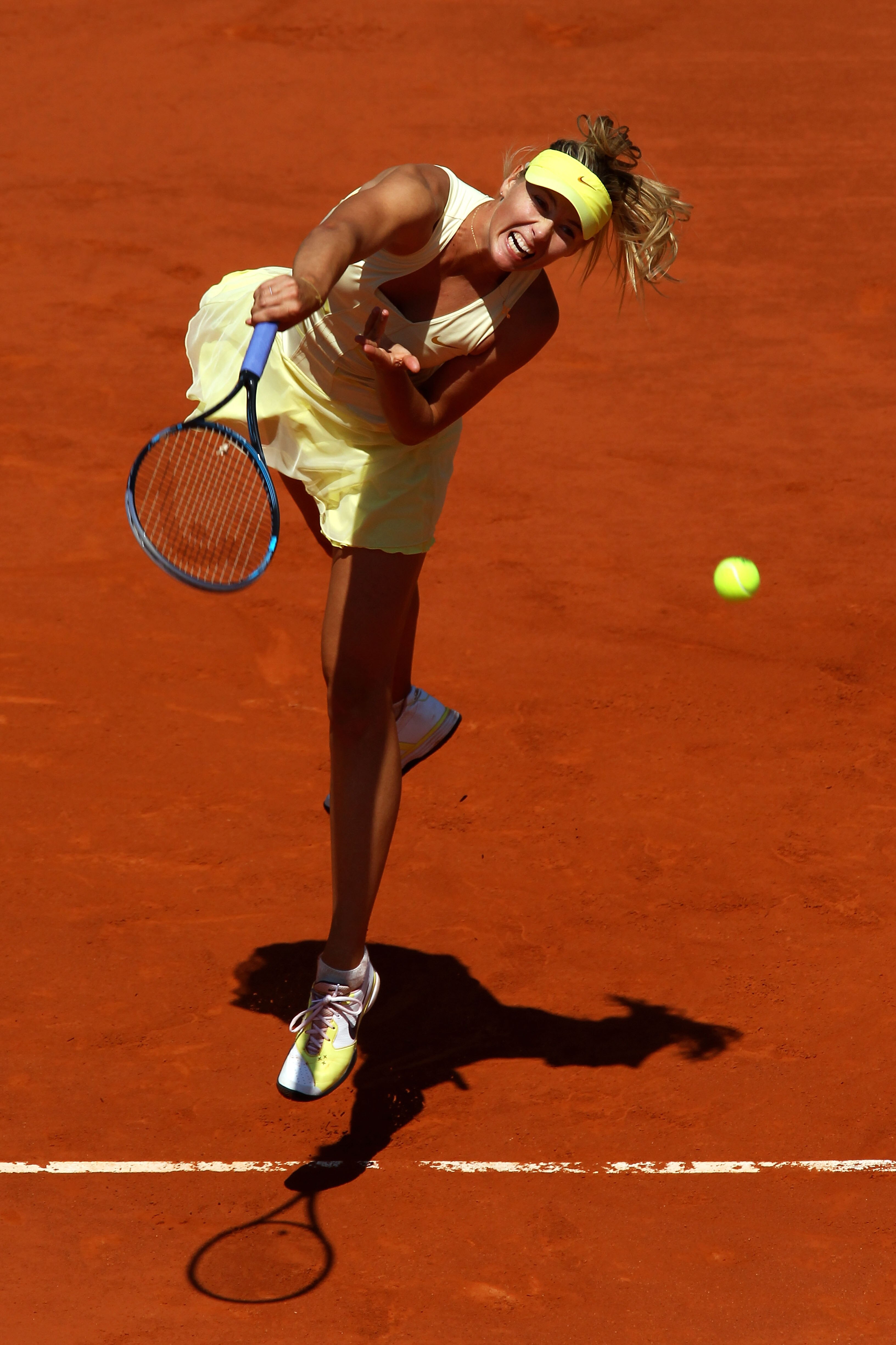 PARIS, FRANCE - JUNE 02:  Maria Sharapova of Russia serves during the women's singles semi final match between Na Li of China and Maria Sharapova of Russia on day twelve of the French Open at Roland Garros on June 2, 2011 in Paris, France.  (Photo by Alex