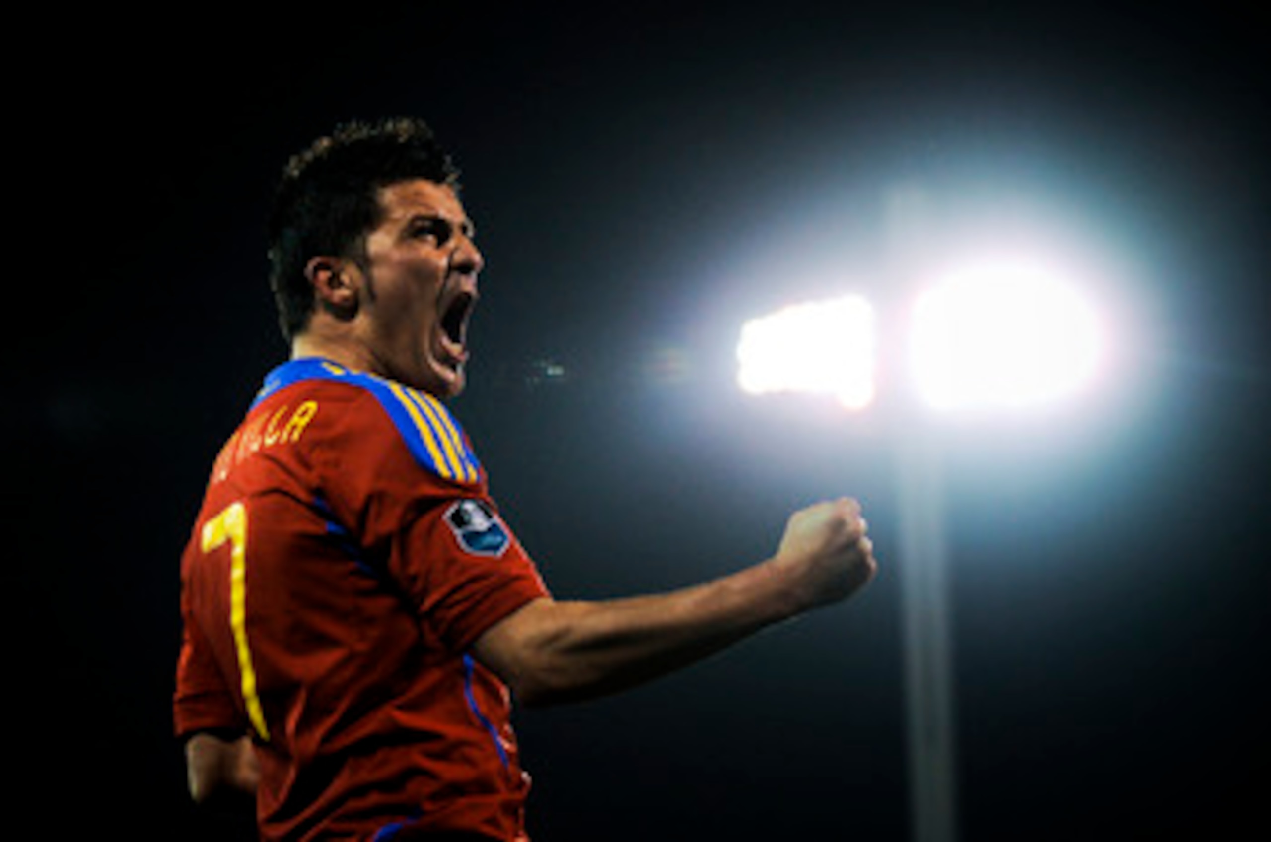 GRANADA, SPAIN - MARCH 25:  David Villa of Spain (R) celebrates after scoring his second goal during the UEFA EURO 2012 qualifier between Spain and Czech Republic at Los Carmenes Stadium on March 25, 2011 in Granada, Spain.  Spain win 2-1. (Photo by David