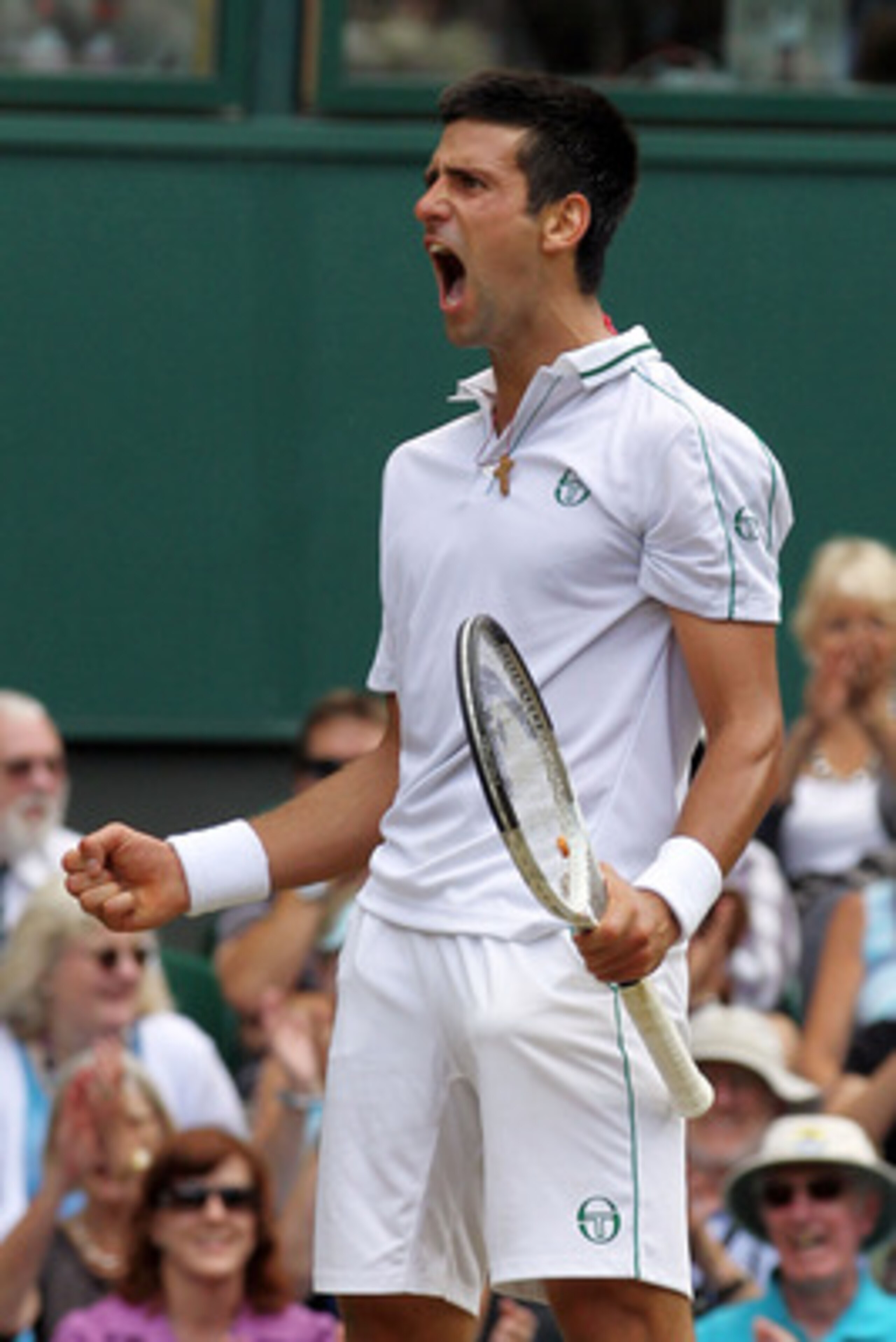 LONDON, ENGLAND - JULY 02:  Novak Djokovic of Serbia celebrates a point during the Menï¿½s Semi Final match against Tomas Berdych of Czech Republic on Day Eleven of the Wimbledon Lawn Tennis Championships at the All England Lawn Tennis and Croquet Club on J