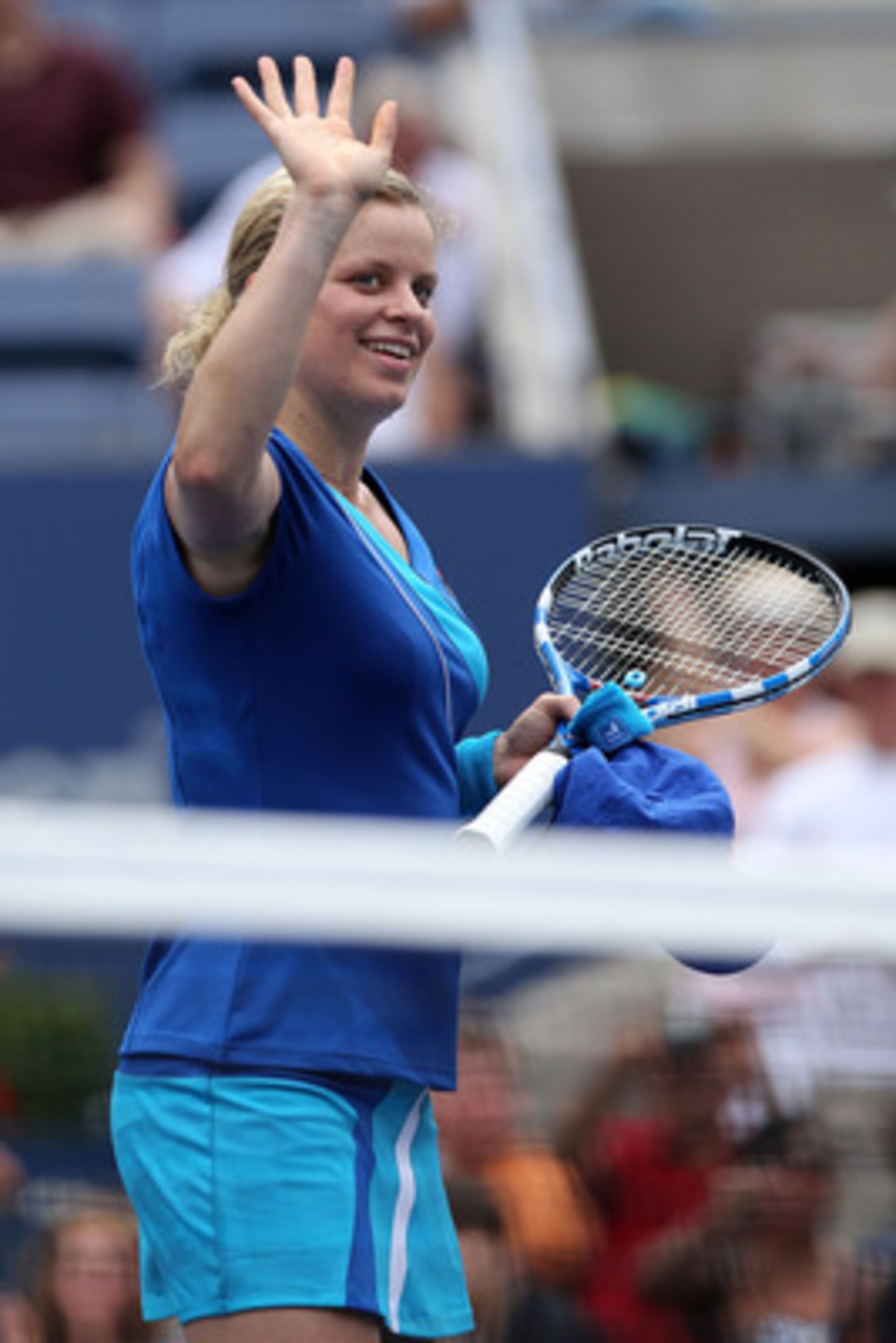 NEW YORK - SEPTEMBER 03:  Kim Clijsters of Belgium waves to the fans as she celebrates winning her women's singles match against Petra Kvitova of the Czech Republic  on day five of the 2010 U.S. Open at the USTA Billie Jean King National Tennis Center on 