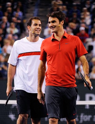 INDIAN WELLS, CA - MARCH 12:  Former tennis player Pete Sampras and Roger Federer of Switzerland,during Hit for Haiti, a charity event during the BNP Paribas Open on March 12, 2010 in Indian Wells, California.  (Photo by Kevork Djansezian/Getty Images)