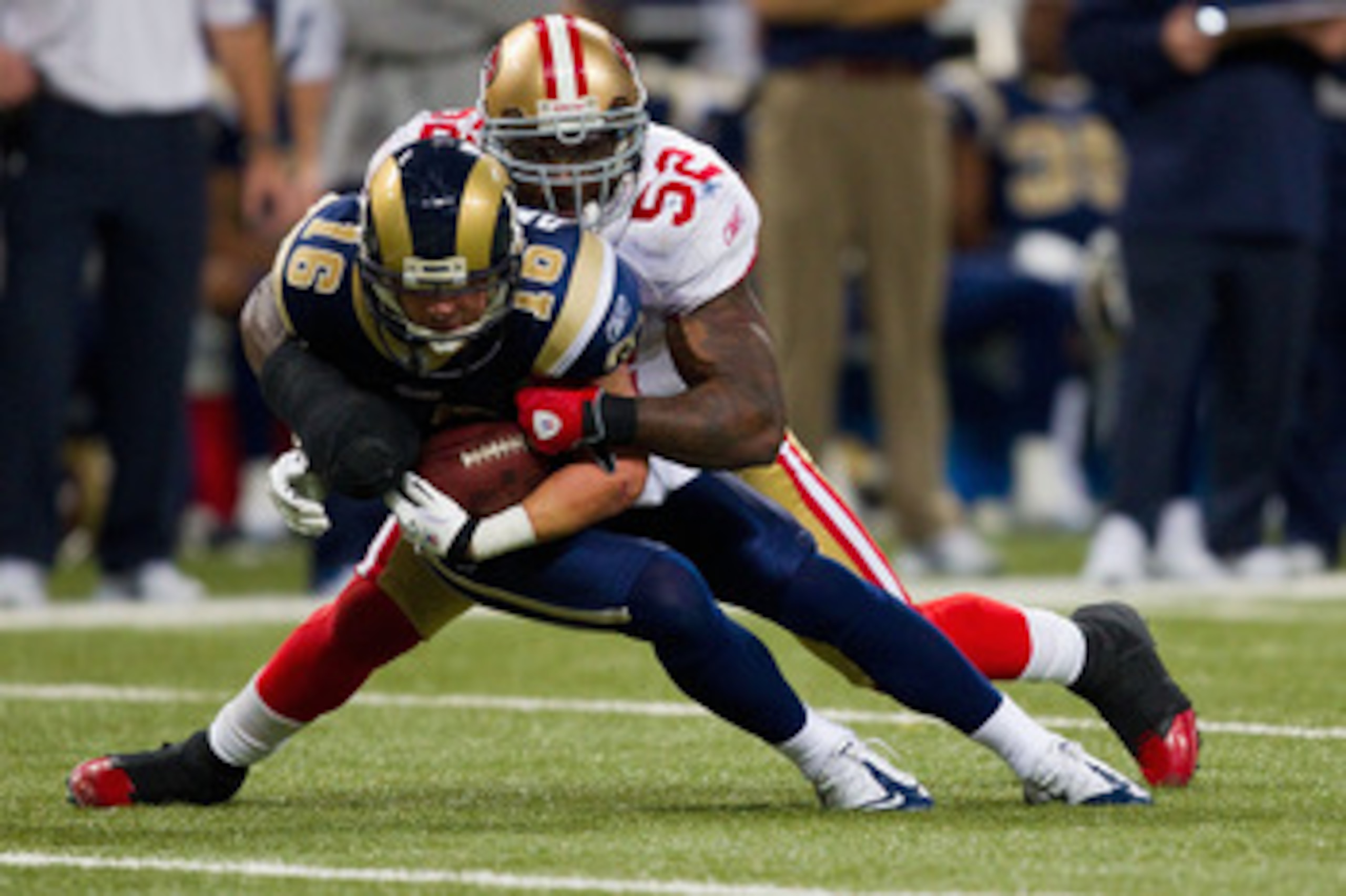 ST. LOUIS, MO - DECEMBER 26: Patrick Willis #52 of the San Francisco 49ers tackles Danny Amendola #16 of the St. Louis Rams at the Edward Jones Dome on December 26, 2010 in St. Louis, Missouri. The Rams beat the 49ers 25-17. (Photo by Dilip Vishwanat/Gett