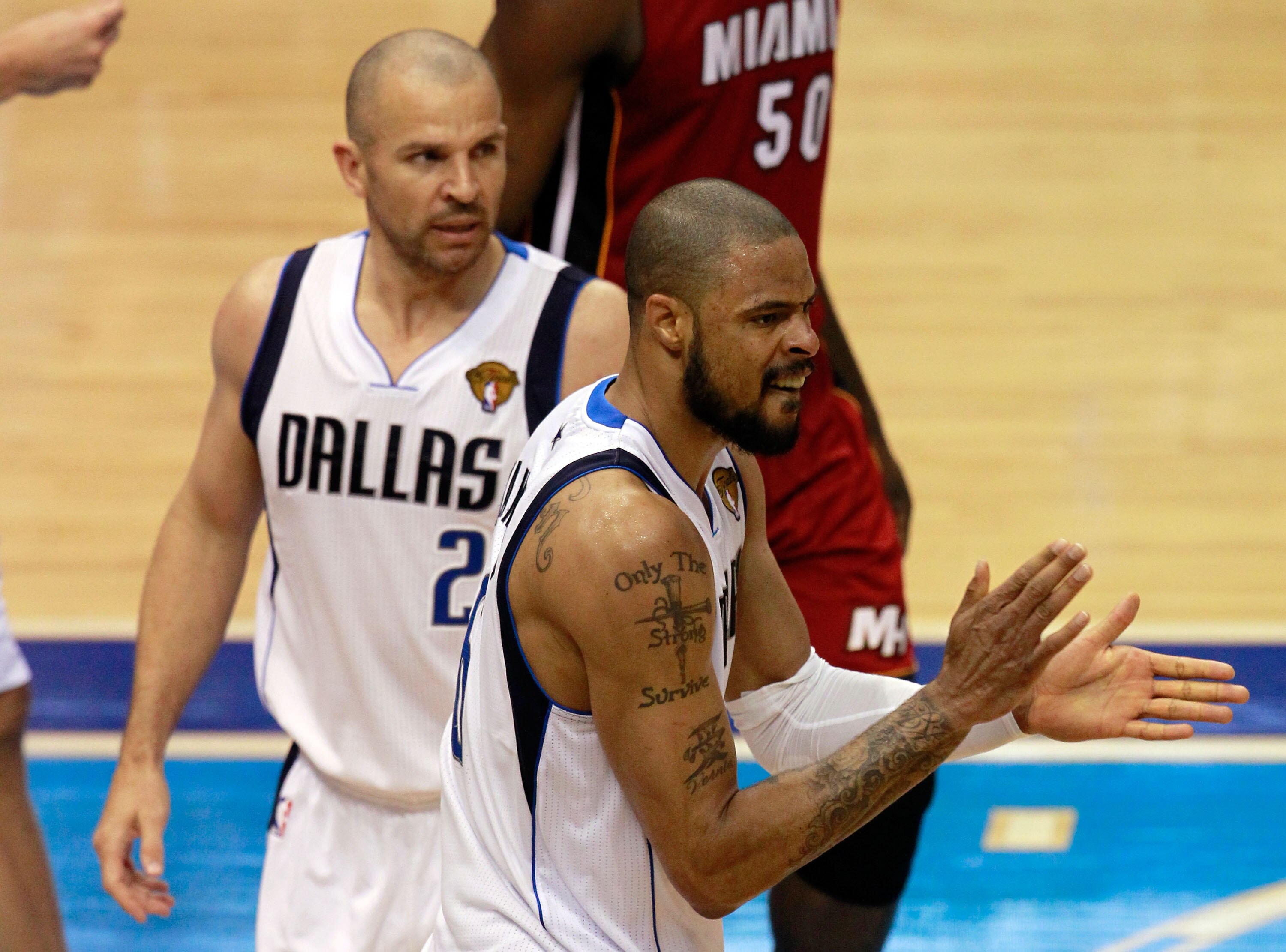 DALLAS, TX - JUNE 05:  (R) Tyson Chandler #6 of the Dallas Mavericks reacts in the third quarter while taking on the Miami Heat in Game Three of the 2011 NBA Finals at American Airlines Center on June 5, 2011 in Dallas, Texas.  NOTE TO USER: User expressl