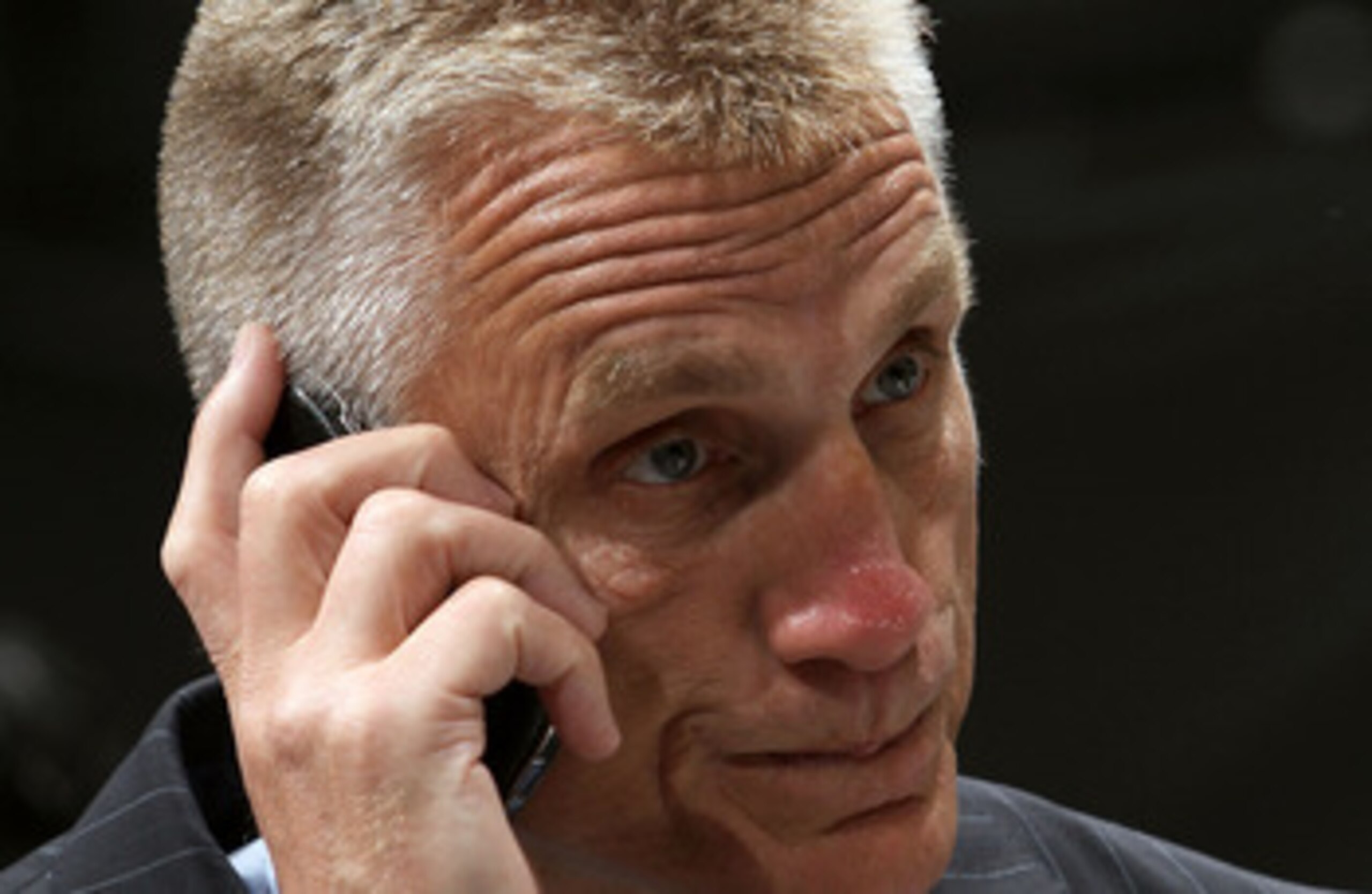 LOS ANGELES, CA - JUNE 25:  Philadelphia Flyers General Manager Paul Holmgren speaks on the phone during the 2010 NHL Entry Draft at Staples Center on June 25, 2010 in Los Angeles, California.  (Photo by Bruce Bennett/Getty Images)