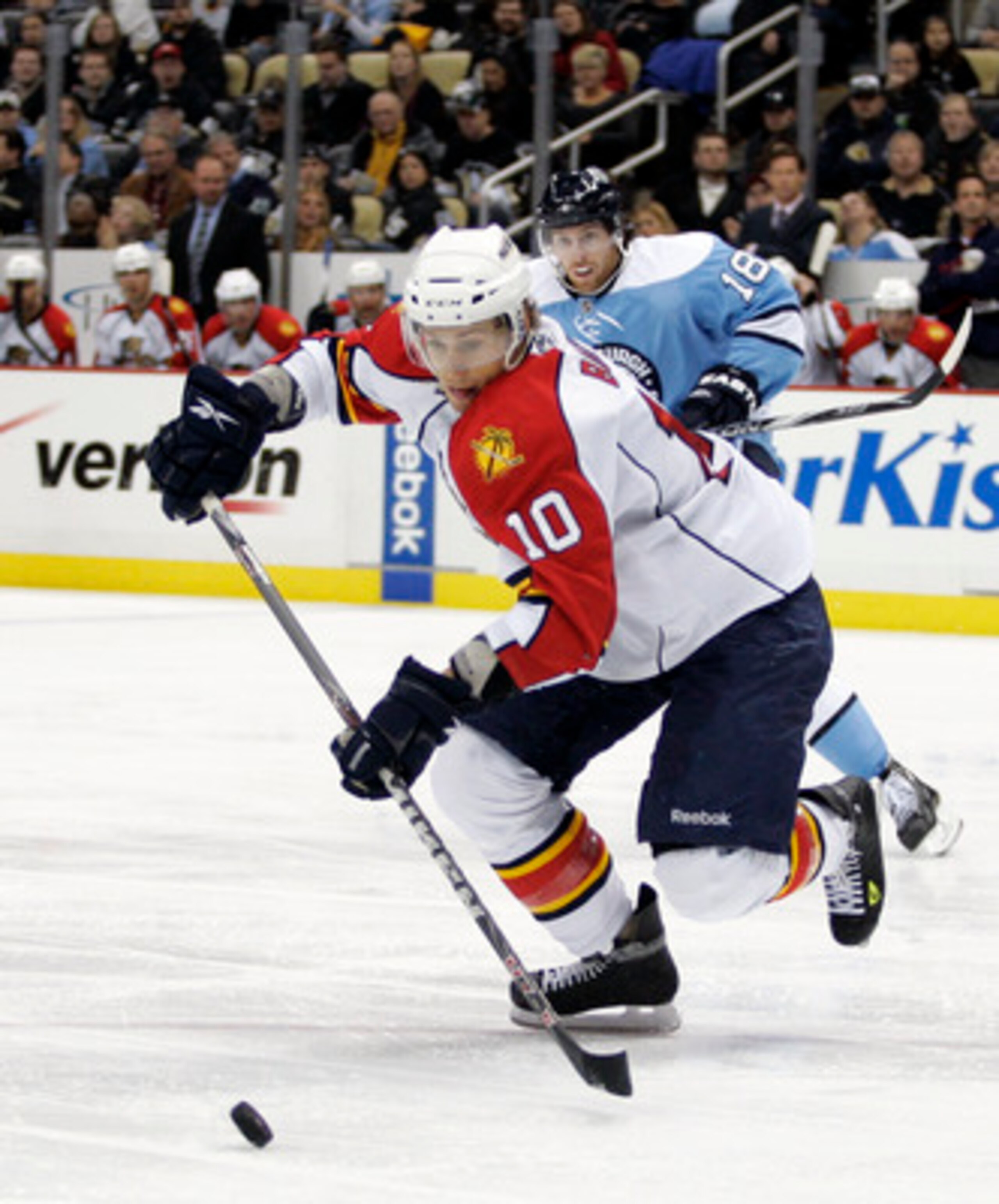 PITTSBURGH, PA - MARCH 27: David Booth #10 of the Florida Panthers handles the puck against the Pittsburgh Penguins at Consol Energy Center on March 27, 2011 in Pittsburgh, Pennsylvania. The Penguins defeated the Panthers 2-1 in a shootout. (Photo by Just