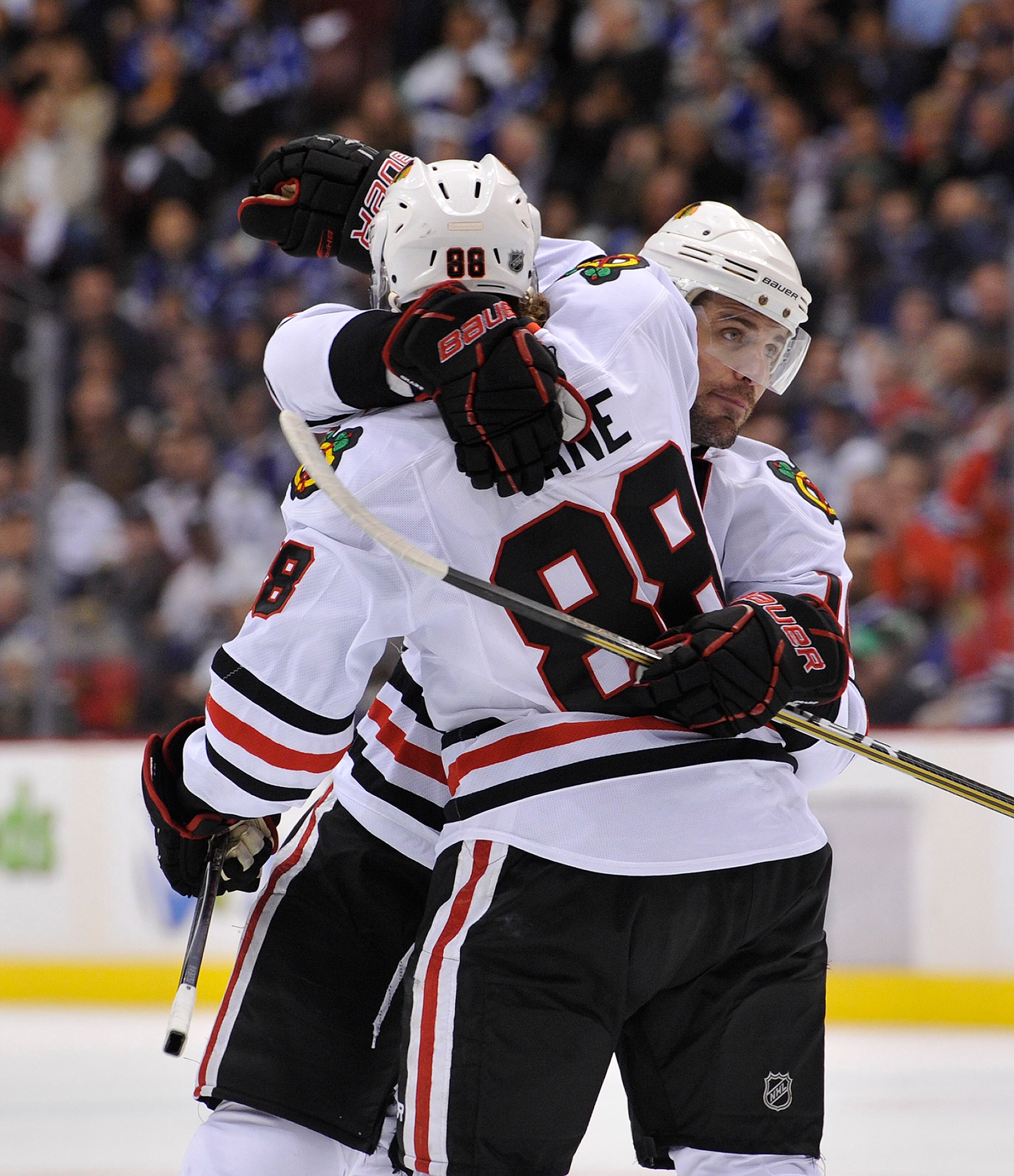 VANCOUVER, CANADA - APRIL 21: Patrick Sharp #10 of the Chicago Blackhawks congratulates Patrick Kane #88 after scoring against the Vancouver Canucks during the first period in Game Five of the Western Conference Quarterfinals during the 2011 NHL Stanley C