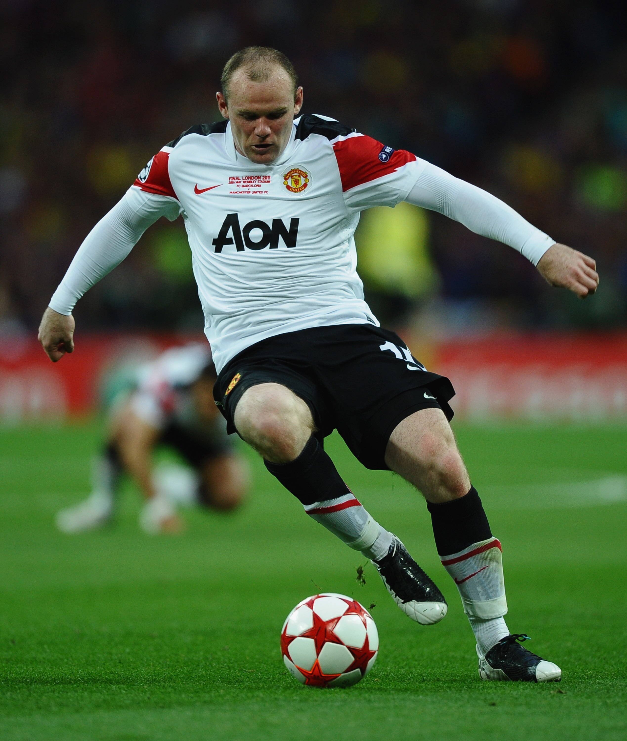 LONDON, ENGLAND - MAY 28:  Wayne Rooney of Manchester United  in action during the UEFA Champions League final between FC Barcelona and Manchester United FC at Wembley Stadium on May 28, 2011 in London, England.  (Photo by Laurence Griffiths/Getty Images)