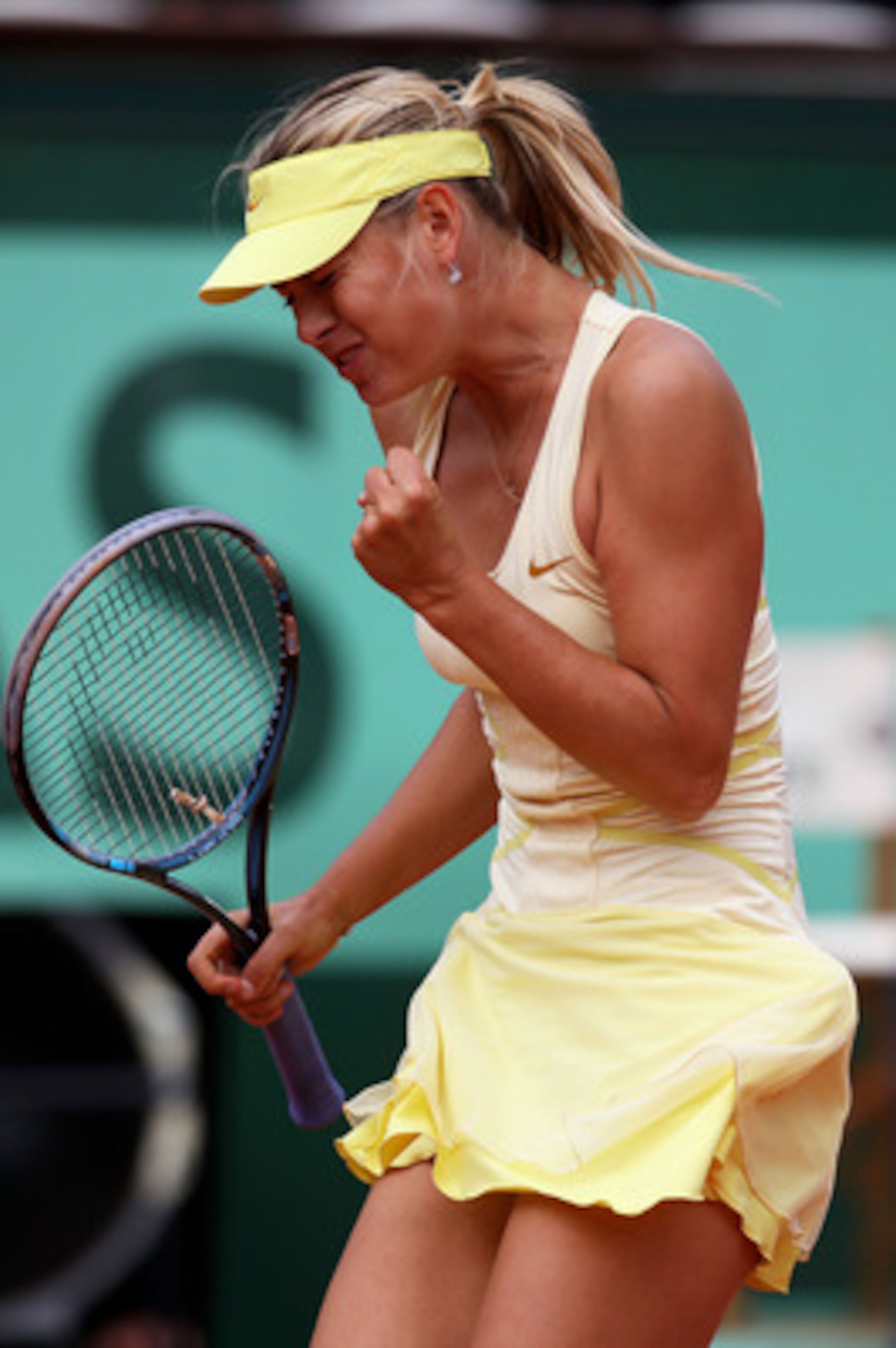 PARIS, FRANCE - MAY 26:  Maria Sharapova of Russia celebrates a point during the women's singles round two match between Maria Sharapova of Russia and Caroline Garcia of France on day five of the French Open at Roland Garros on May 26, 2011 in Paris, Fran