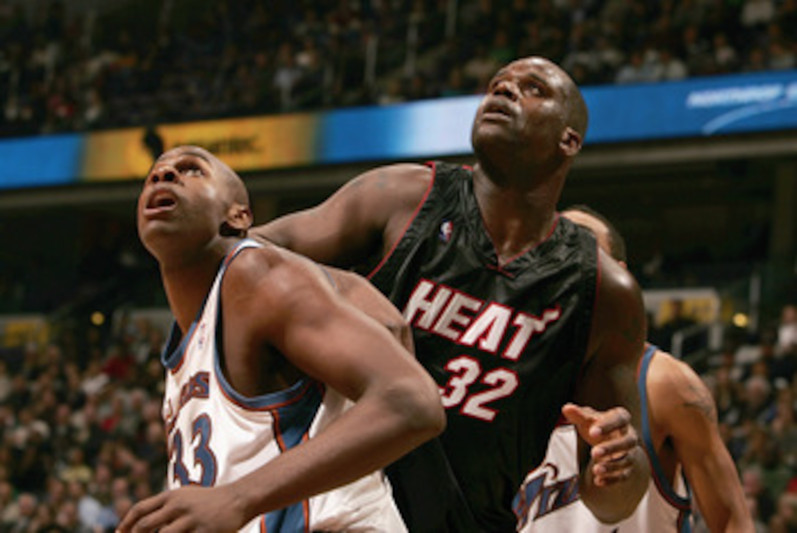 WAHINGTON - DECEMBER 15:  Brendan Haywood #33 of the Washington Wizards and Shaquille O'Neal #32 of the Miami Heat battle for rebound position during the game on December 15, 2004 at the MCI Center in Washington D.C. The Heat won 98-93.  NOTE TO USER:  Us