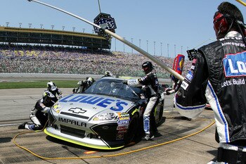 KANSAS CITY, KS - JUNE 05:  Jimmie Johnson pits the #48 Lowe's/Kobalt Tools Chevrolet during the NASCAR Sprint Cup Series STP 400 at Kansas Speedway on June 5, 2011 in Kansas City, Kansas.  (Photo by Tim Umphrey/Getty Images for NASCAR)