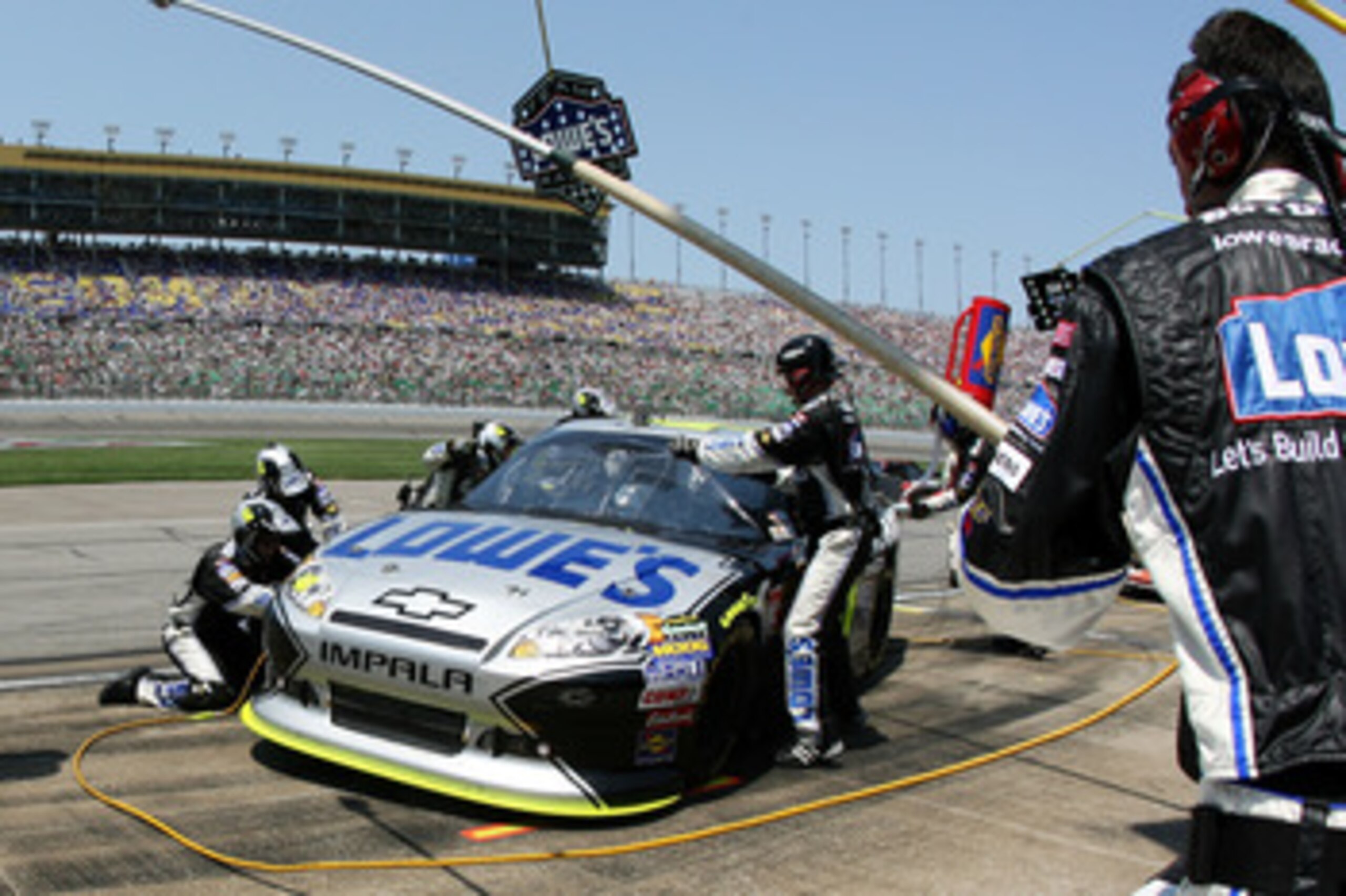 KANSAS CITY, KS - JUNE 05:  Jimmie Johnson pits the #48 Lowe's/Kobalt Tools Chevrolet during the NASCAR Sprint Cup Series STP 400 at Kansas Speedway on June 5, 2011 in Kansas City, Kansas.  (Photo by Tim Umphrey/Getty Images for NASCAR)