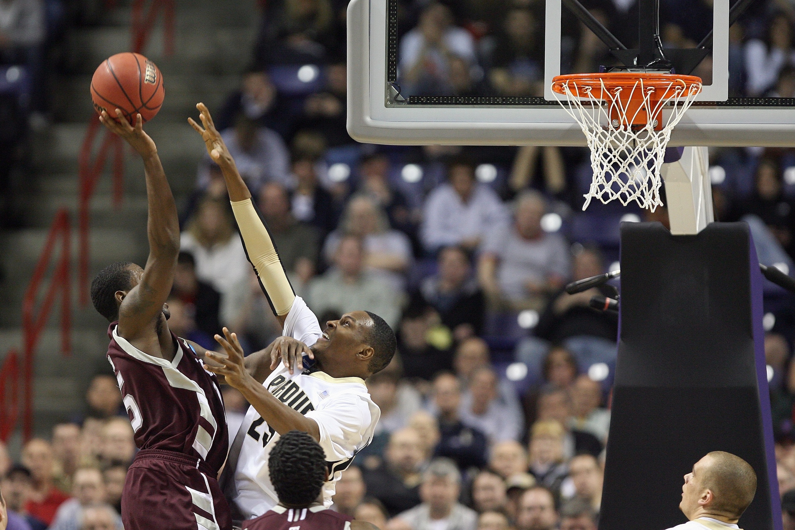 SPOKANE,WA - MARCH 21: JaJuan Johnson #25 of the Purdue Boilermakers blocks the shot against the Texas A&M Aggies during the second round of the 2010 NCAA men's basketball tournament at the Spokane Arena on March 21, 2010 in Spokane, Washington. Purdue de