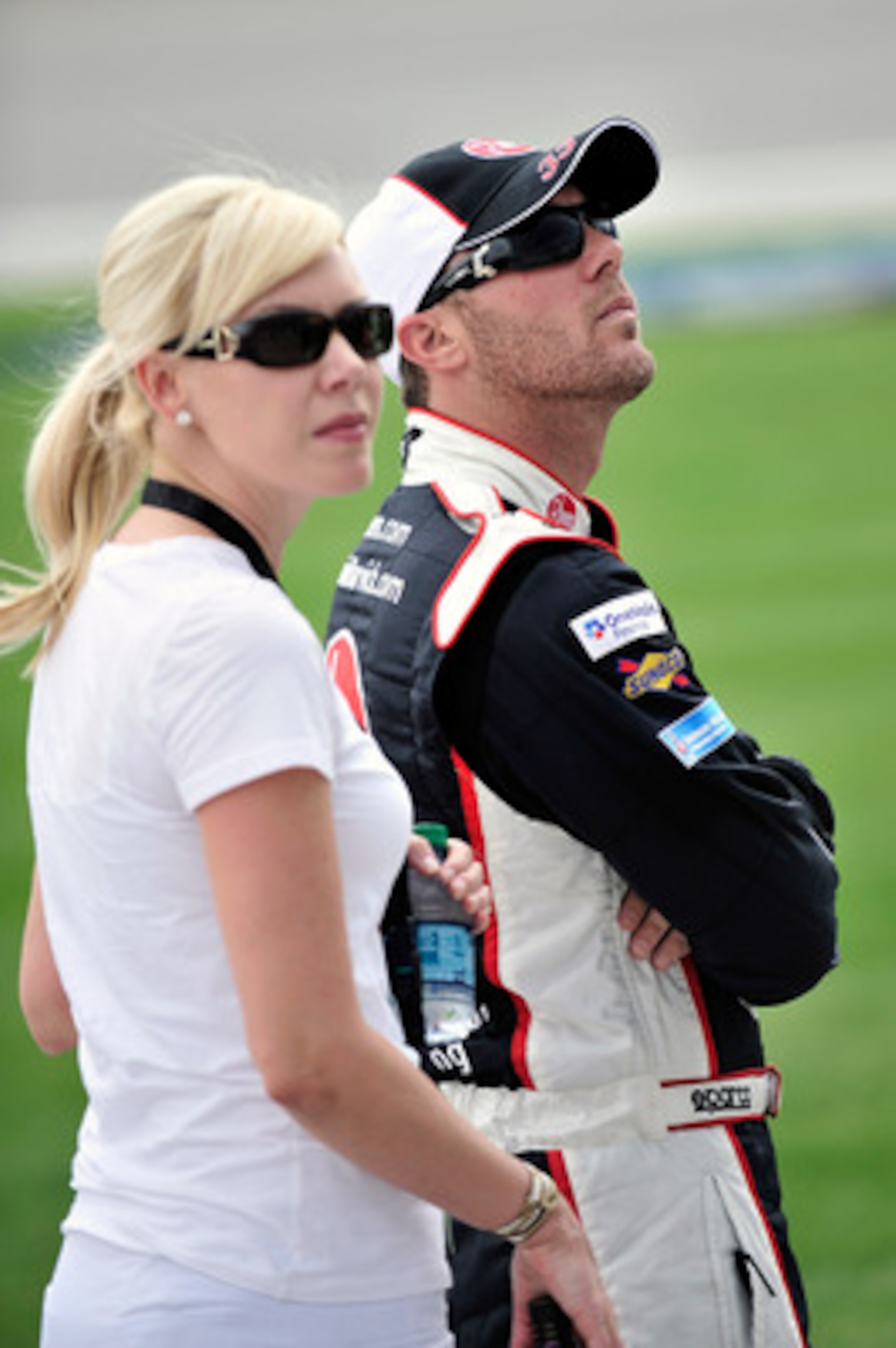 JOLIET, IL - JUNE 04:  Kevin Harvick, driver of the #33 Rheem Chevrolet, stands on the grid with wife DeLana, during qualifying for the NASCAR Nationwide Series STP 300 at Chicagoland Speedway on June 4, 2011 in Joliet, Illinois.  (Photo by Jason Smith/Ge