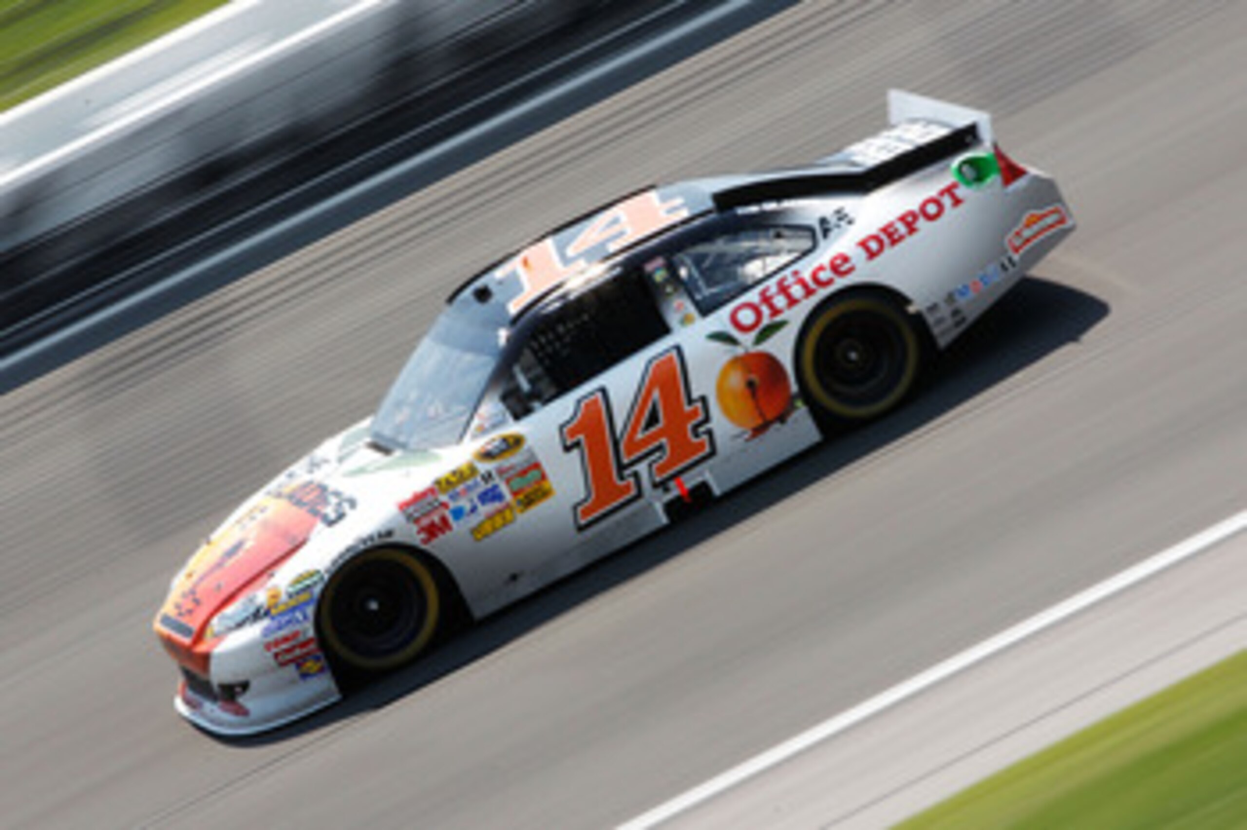 KANSAS CITY, KS - JUNE 05:  Tony Stewart, driver of the #14 The Glades/Office Depot Chevrolet, races during the NASCAR Sprint Cup Series STP 400 at Kansas Speedway on June 5, 2011 in Kansas City, Kansas.  (Photo by Geoff Burke/Getty Images for NASCAR)