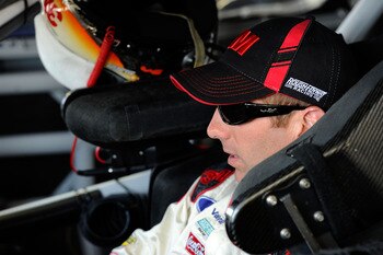 KANSAS CITY, KS - JUNE 03:  Greg Biffle, driver of the #16 3M/Walgreens Ford, sits in his car in the garage area during practice for the NASCAR Sprint Cup Series STP 400 at Kansas Speedway on June 3, 2011 in Kansas City, Kansas.  (Photo by John Harrelson/