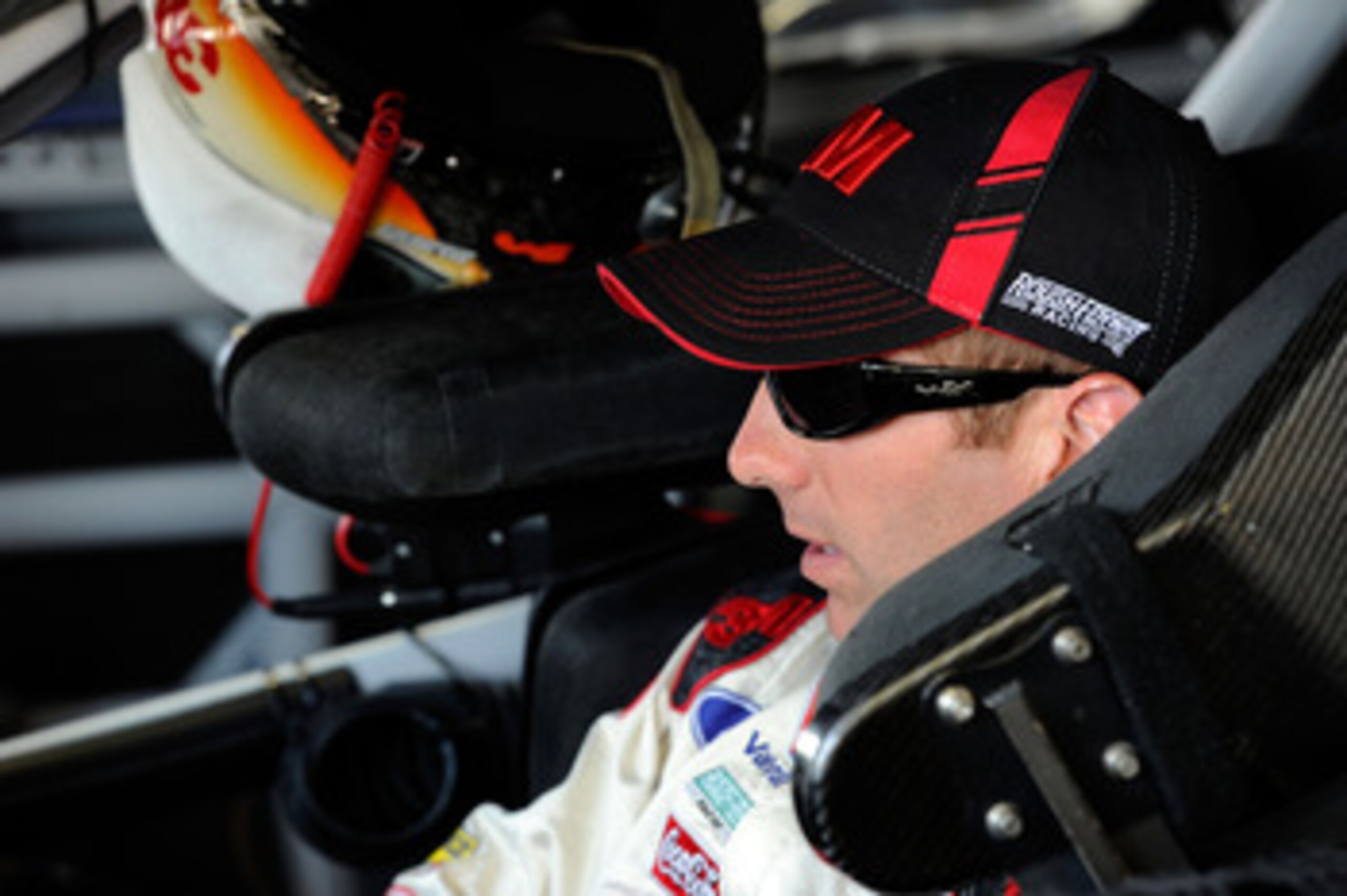 KANSAS CITY, KS - JUNE 03:  Greg Biffle, driver of the #16 3M/Walgreens Ford, sits in his car in the garage area during practice for the NASCAR Sprint Cup Series STP 400 at Kansas Speedway on June 3, 2011 in Kansas City, Kansas.  (Photo by John Harrelson/