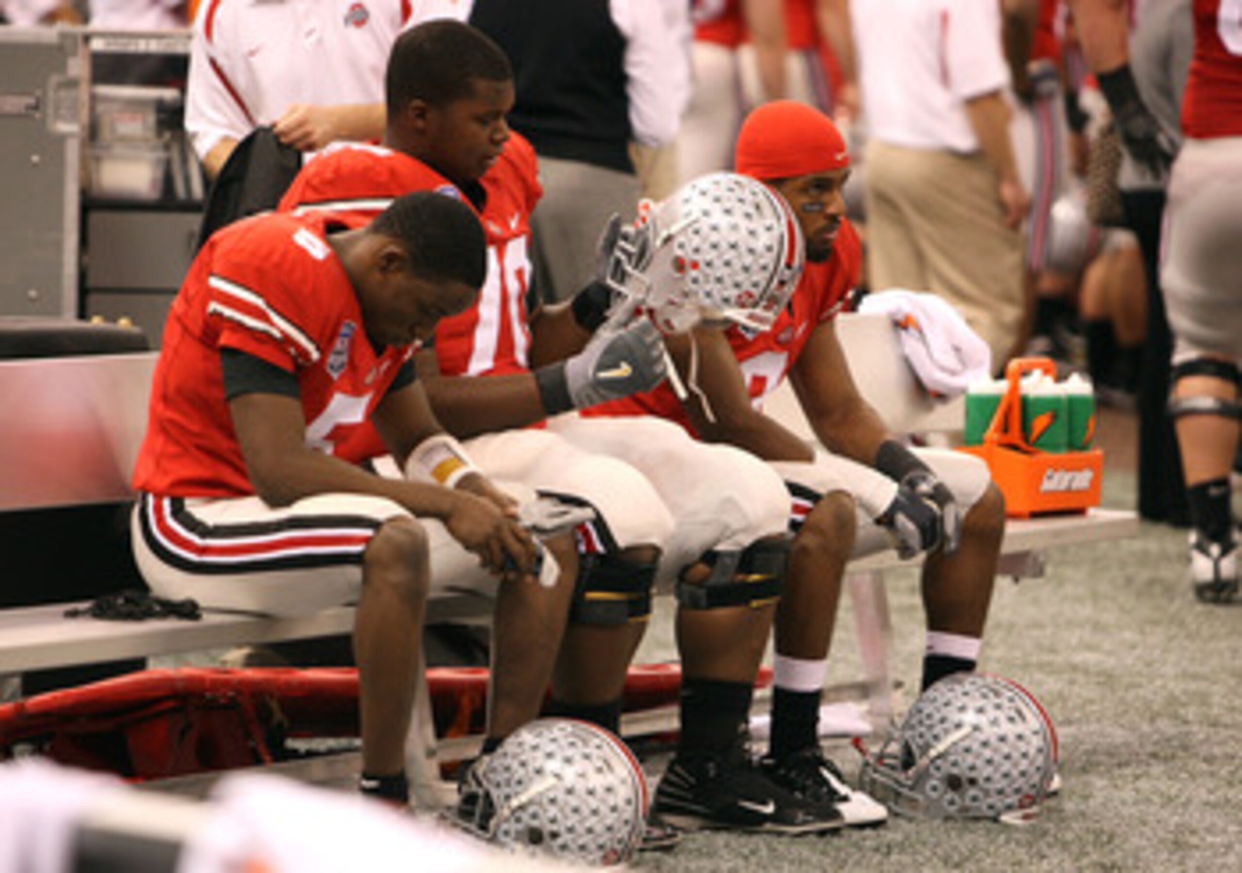 NEW ORLEANS - JANUARY 07:  Members of the Ohio State Buckeyes sit dejected after losing 38-24 to the Louisiana State University Tigers during the AllState BCS National Championship on January 7, 2008 at the Louisiana Superdome in New Orleans, Louisiana.  