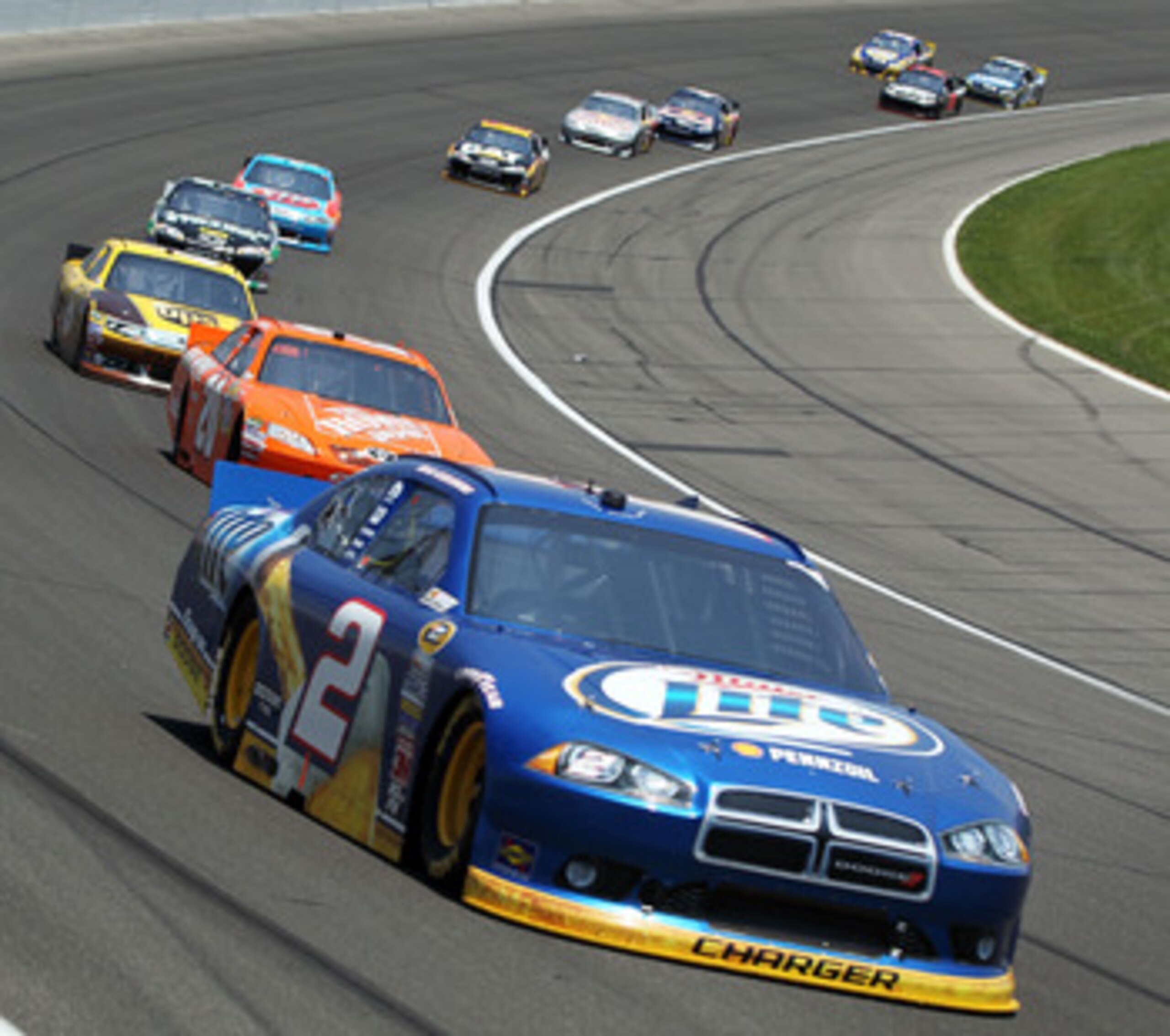 KANSAS CITY, KS - JUNE 05:  Brad Keselowski, driver of the #2 Miller Lite Dodge, leads a group of cars during the NASCAR Sprint Cup Series STP 400 at Kansas Speedway on June 5, 2011 in Kansas City, Kansas.  (Photo by Jamie Squire/Getty Images)