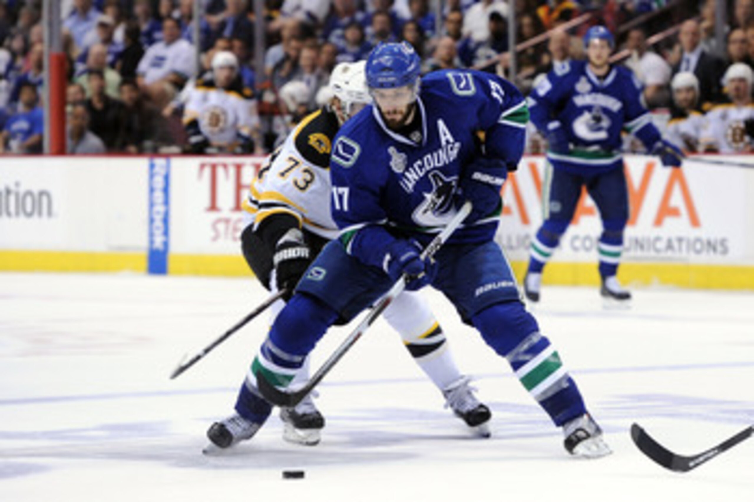 VANCOUVER, BC - JUNE 04:  Ryan Kesler #17 of the Vancouver Canucks skates against Michael Ryder #73 of the Boston Bruins during Game Two of the 2011 NHL Stanley Cup Final at Rogers Arena on June 4, 2011 in Vancouver, British Columbia, Canada.  (Photo by H