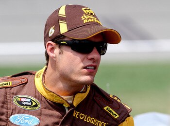 KANSAS CITY, KS - JUNE 04:  David Ragan, driver of the #6 UPS Ford, stands on the grid during qualifying for the NASCAR Sprint Cup Series STP 400 at Kansas Speedway on June 4, 2011 in Kansas City, Kansas.  (Photo by Jerry Markland/Getty Images for NASCAR)