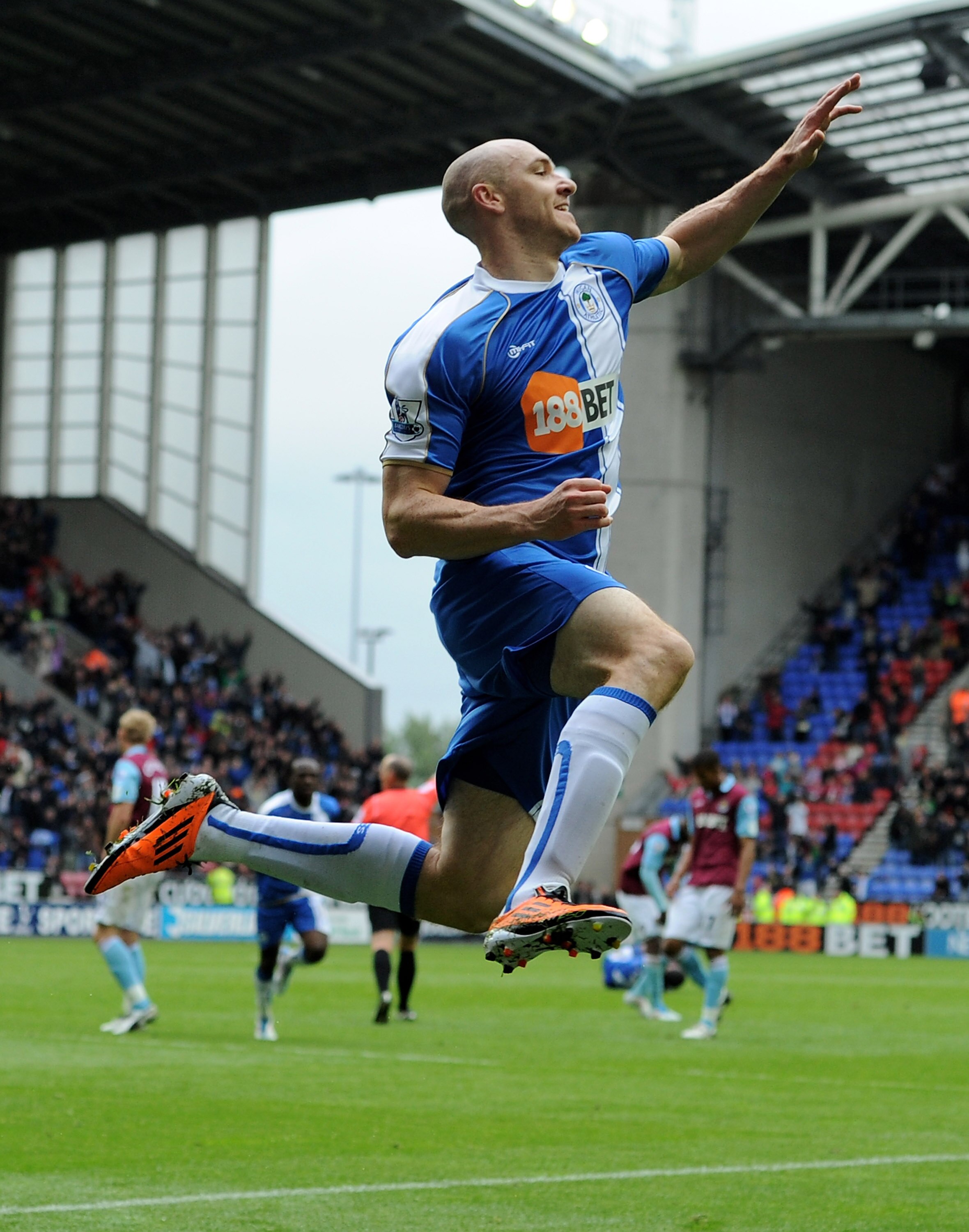 WIGAN, ENGLAND - MAY 15:  Conor Sammon of Wigan Athletic celebrates scoring his team's second goal during the Barclays Premier League match between Wigan Athletic and West Ham United at the DW Stadium on May 15, 2011 in Wigan, England.  (Photo by Chris Br