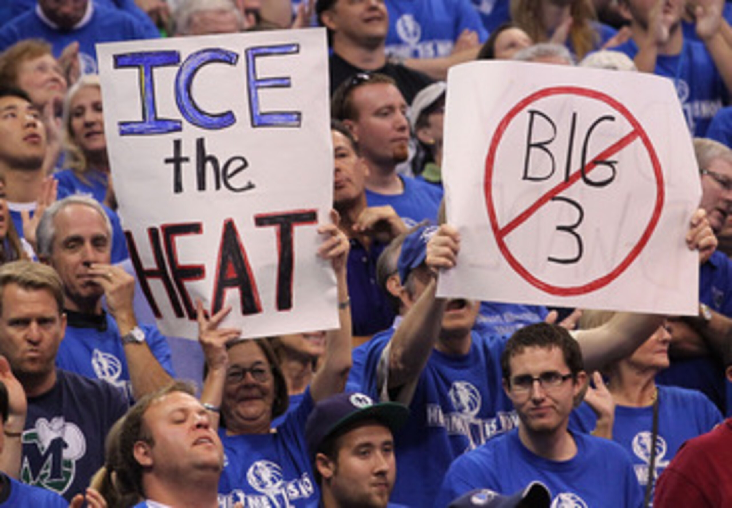 DALLAS, TX - JUNE 05:  Dallas Mavericks fans hold up signs in the third quarter while taking on the Miami Heat in Game Three of the 2011 NBA Finals at American Airlines Center on June 5, 2011 in Dallas, Texas.  NOTE TO USER: User expressly acknowledges an