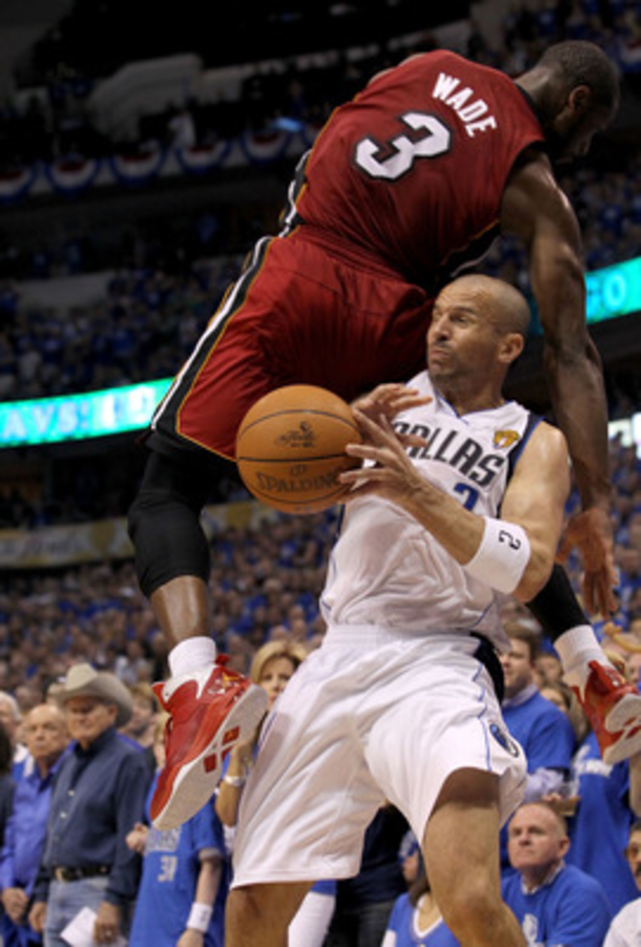 DALLAS, TX - JUNE 05:  Dwyane Wade #3 of the Miami Heat fouls Jason Kidd #2 of the Dallas Mavericks in the second quarter of Game Three of the 2011 NBA Finals at American Airlines Center on June 5, 2011 in Dallas, Texas.  NOTE TO USER: User expressly ackn