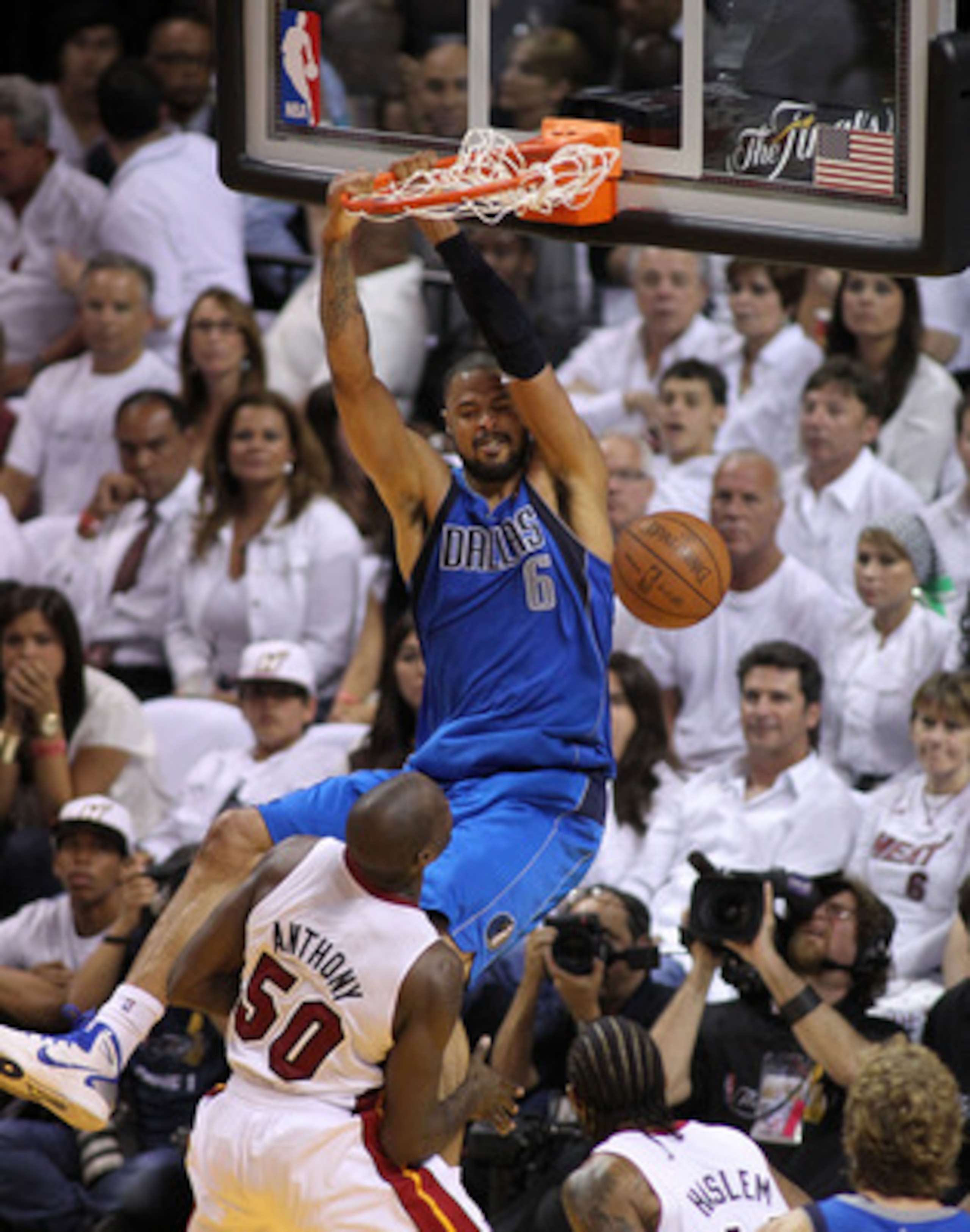 MIAMI, FL - MAY 31:  Tyson Chandler #6 of the Dallas Mavericks dunks the ball against Joel Anthony #50 of the Miami Heat in the first half in Game One of the 2011 NBA Finals at American Airlines Arena on May 31, 2011 in Miami, Florida. NOTE TO USER: User