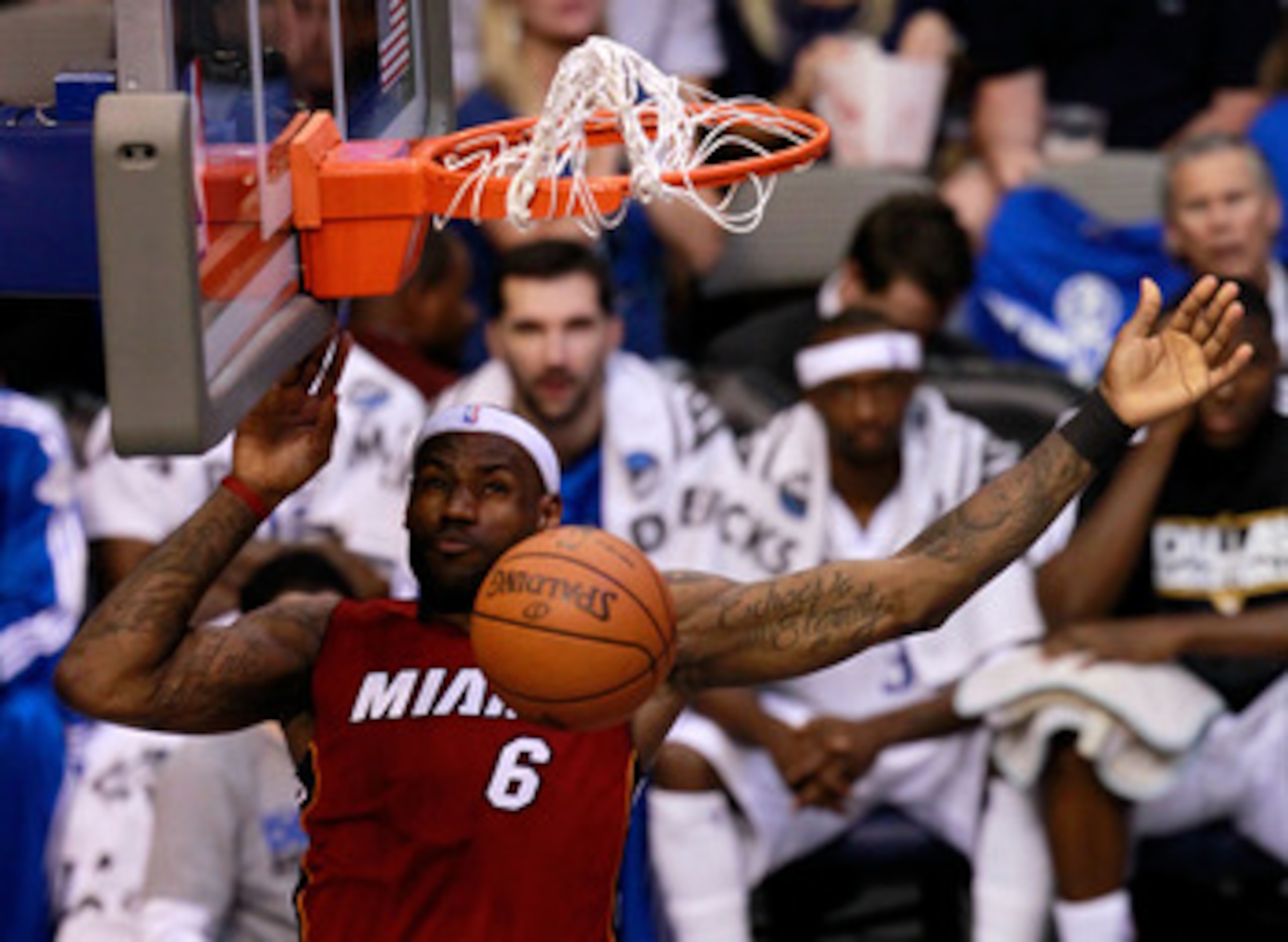 DALLAS, TX - JUNE 05:  LeBron James #6 of the Miami Heat dunks the ball in the third quarter while taking on the Dallas Mavericks in Game Three of the 2011 NBA Finals at American Airlines Center on June 5, 2011 in Dallas, Texas.  NOTE TO USER: User expres
