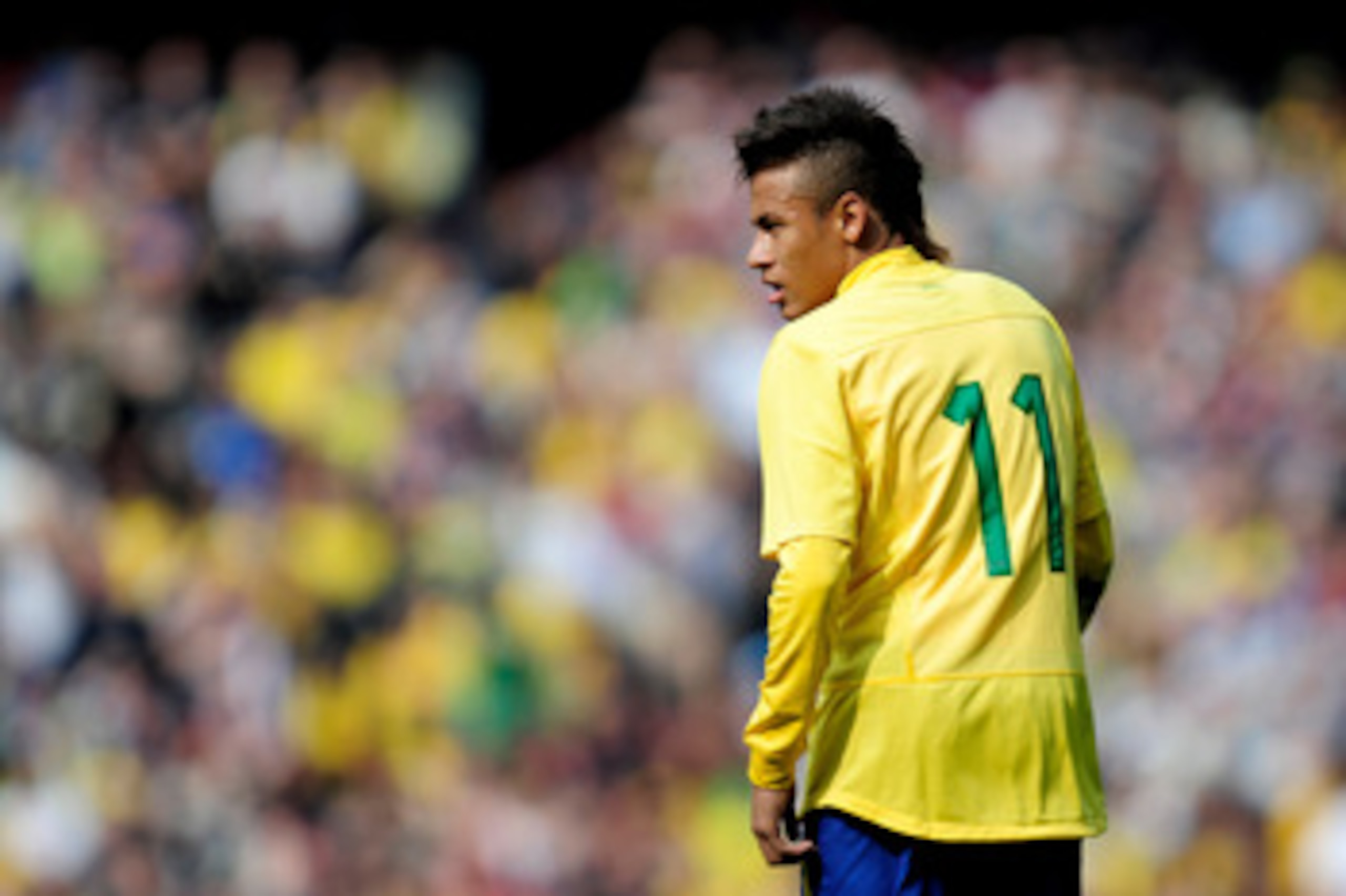 LONDON, ENGLAND - MARCH 27: Neymar of Brazil looks on during the International friendly match between Brazil and Scotland at Emirates Stadium on March 27, 2011 in London, England.  (Photo by Jamie McDonald/Getty Images)