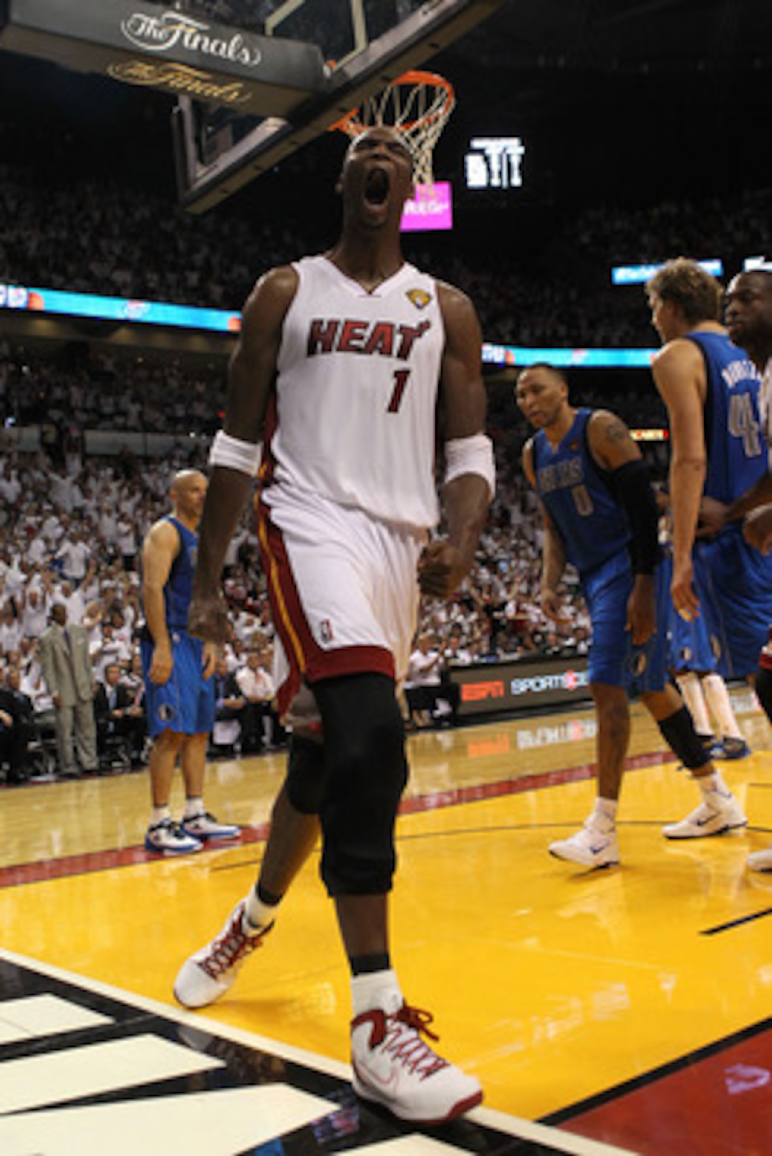 MIAMI, FL - JUNE 02:  Chris Bosh #1 of the Miami Heat reacts in the fourth quarter while taking on the Dallas Mavericks in Game Two of the 2011 NBA Finals at American Airlines Arena on June 2, 2011 in Miami, Florida. NOTE TO USER: User expressly acknowled
