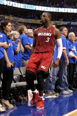 DALLAS, TX - JUNE 05:  Dwyane Wade #3 of the Miami Heat reacts against the Dallas Mavericks in Game Three of the 2011 NBA Finals at American Airlines Center on June 5, 2011 in Dallas, Texas.  NOTE TO USER: User expressly acknowledges and agrees that, by d