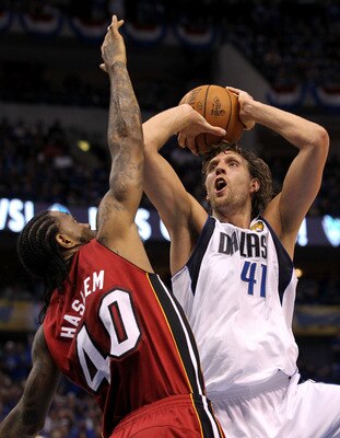 DALLAS, TX - JUNE 05:  Dirk Nowitzki #41 of the Dallas Mavericks attempts a shot against Udonis Haslem #40 of the Miami Heat in Game Three of the 2011 NBA Finals at American Airlines Center on June 5, 2011 in Dallas, Texas.  NOTE TO USER: User expressly a