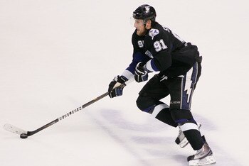 TAMPA, FL - MAY 25:  Steven Stamkos #91 of the Tampa Bay Lightning controls the puck in Game Six of the Eastern Conference Finals against the Boston Bruins during the 2011 NHL Stanley Cup Playoffs at St Pete Times Forum on May 25, 2011 in Tampa, Florida. 