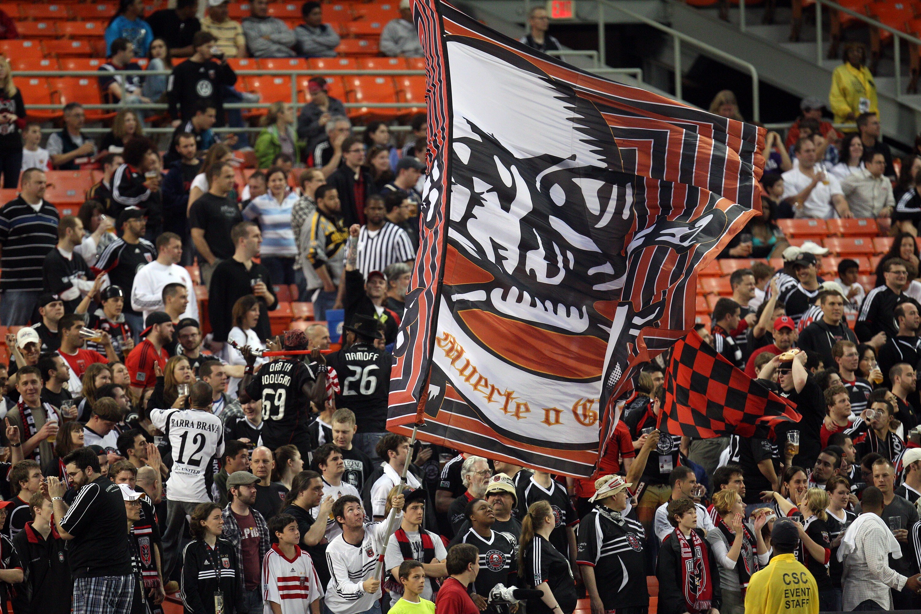 WASHINGTON, DC - MAY 14: Fans of D.C. United waive a flag against the Colorado Rapids at RFK Stadium on May 14, 2011 in Washington, DC. The game ended 1-1. (Photo by Ned Dishman/Getty Images)