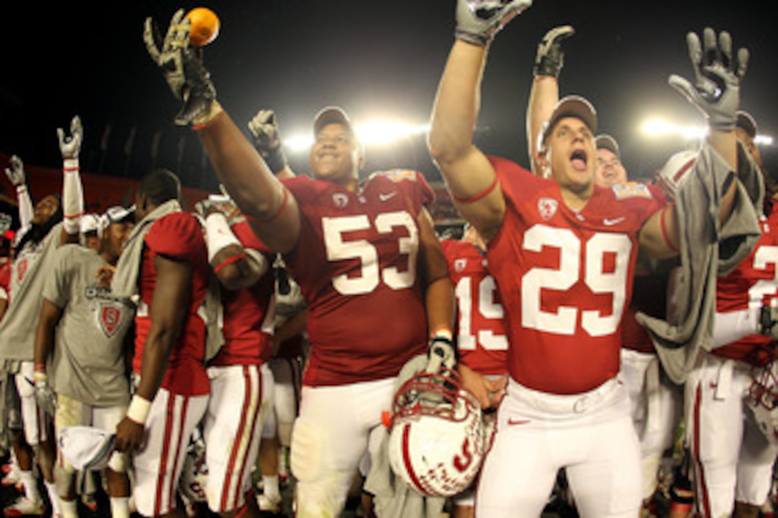 MIAMI, FL - JANUARY 03: Derek Hall #53 and Ed Reynolds #29 of the Stanford Cardinal celebrates after Stanford won 40-12 against the Virginia Tech Hokies during the 2011 Discover Orange Bowl at Sun Life Stadium on January 3, 2011 in Miami, Florida. (Phot MIAMI, FL - JANUARY 03: Derek Hall #53 and Ed Reynolds #29 of the Stanford Cardinal celebrates after Stanford won 40-12 against the Virginia Tech Hokies during the 2011 Discover Orange Bowl at Sun Life Stadium on January 3, 2011 in Miami, Florida. (Phot
