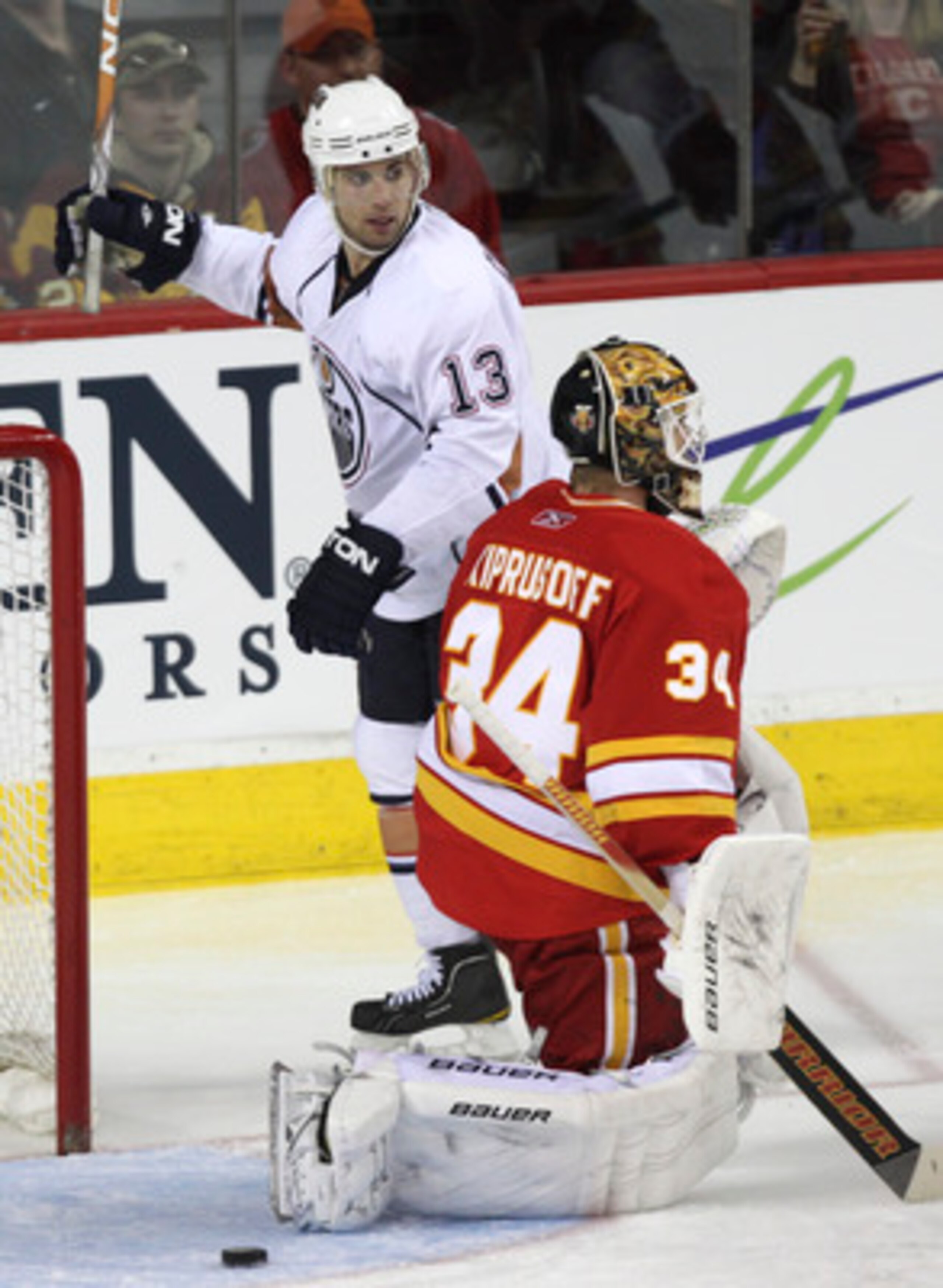 CALGARY, CANADA - APRIL 6: Andrew Cogliano #13 of the Edmonton Oilers celebrates his teams only goal against Miikka Kiprusoff of the Calgary Flames in third period NHL action on April 6, 2011 at the Scotiabank Saddledome in Calgary, Alberta, Canada. (Phot