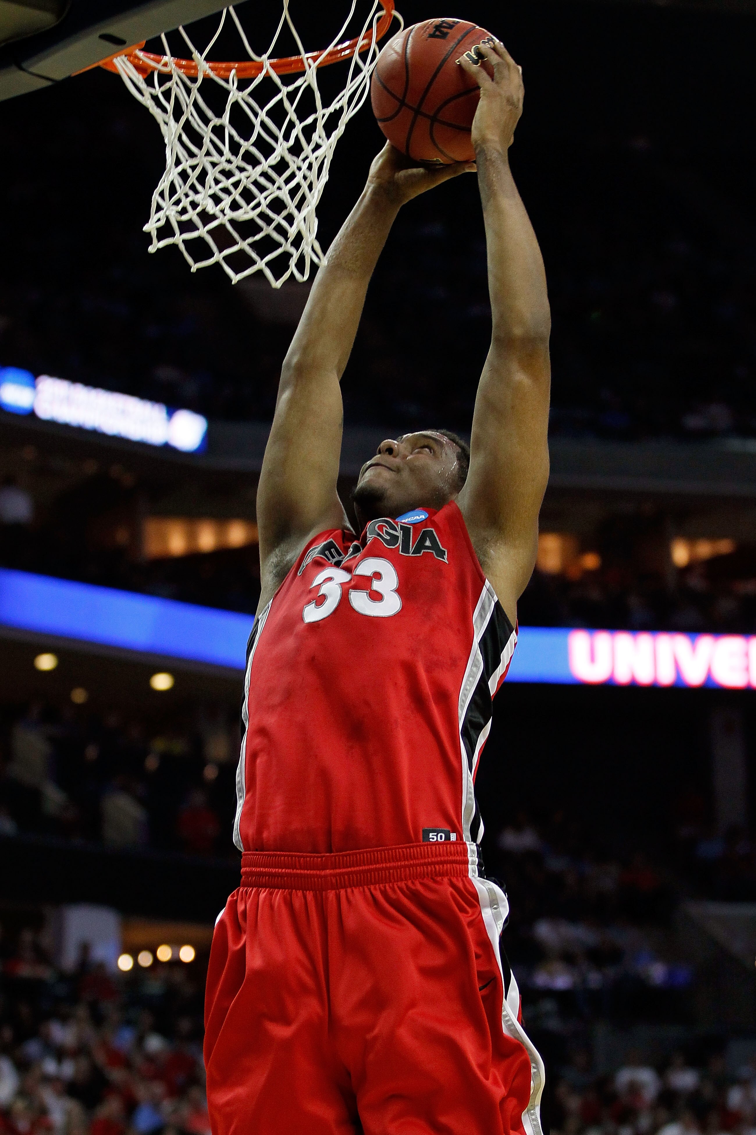 CHARLOTTE, NC - MARCH 18: Trey Thompkins #33 of the Georgia Bulldogs dunks the ball in the first half while taking on the Washington Huskies during the second round of the 2011 NCAA men's basketball tournament at Time Warner Cable Arena on March 18, 2011 CHARLOTTE, NC - MARCH 18: Trey Thompkins #33 of the Georgia Bulldogs dunks the ball in the first half while taking on the Washington Huskies during the second round of the 2011 NCAA men's basketball tournament at Time Warner Cable Arena on March 18, 2011