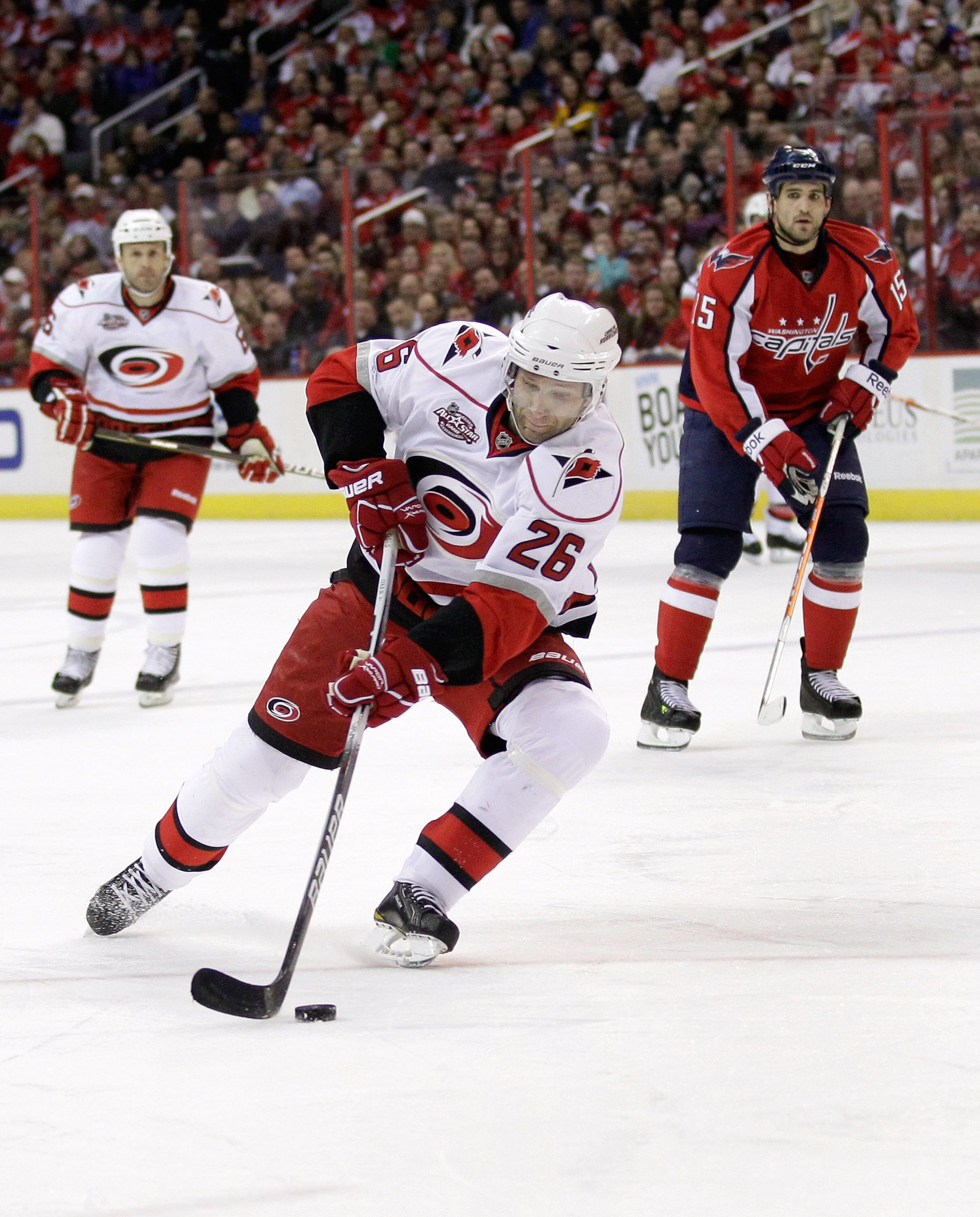 WASHINGTON, DC - MARCH 29:  Erik Cole #26 of the Carolina Hurricanes skates with the puck against the Washington Capitals at the Verizon Center on March 29, 2011 in Washington, DC.  (Photo by Rob Carr/Getty Images)