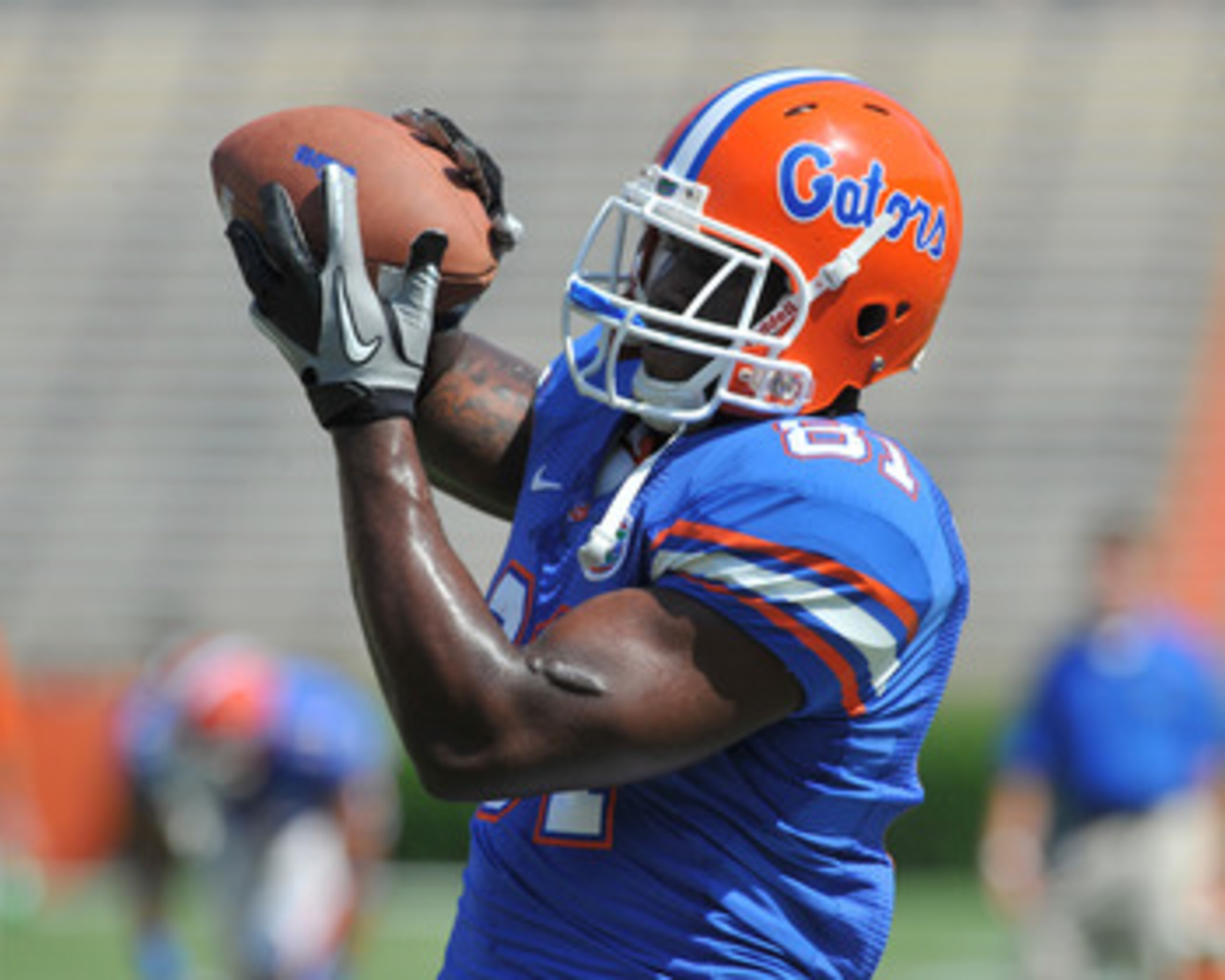 GAINESVILLE, FL - APRIL 9:  Tight end A. C. Leonard #81 of the Florida Gators grabs a warmup pass before the Orange and Blue spring football game April 9, 2011 at Ben Hill Griffin Stadium in  Gainesville, Florida.  (Photo by Al Messerschmidt/Getty Images)