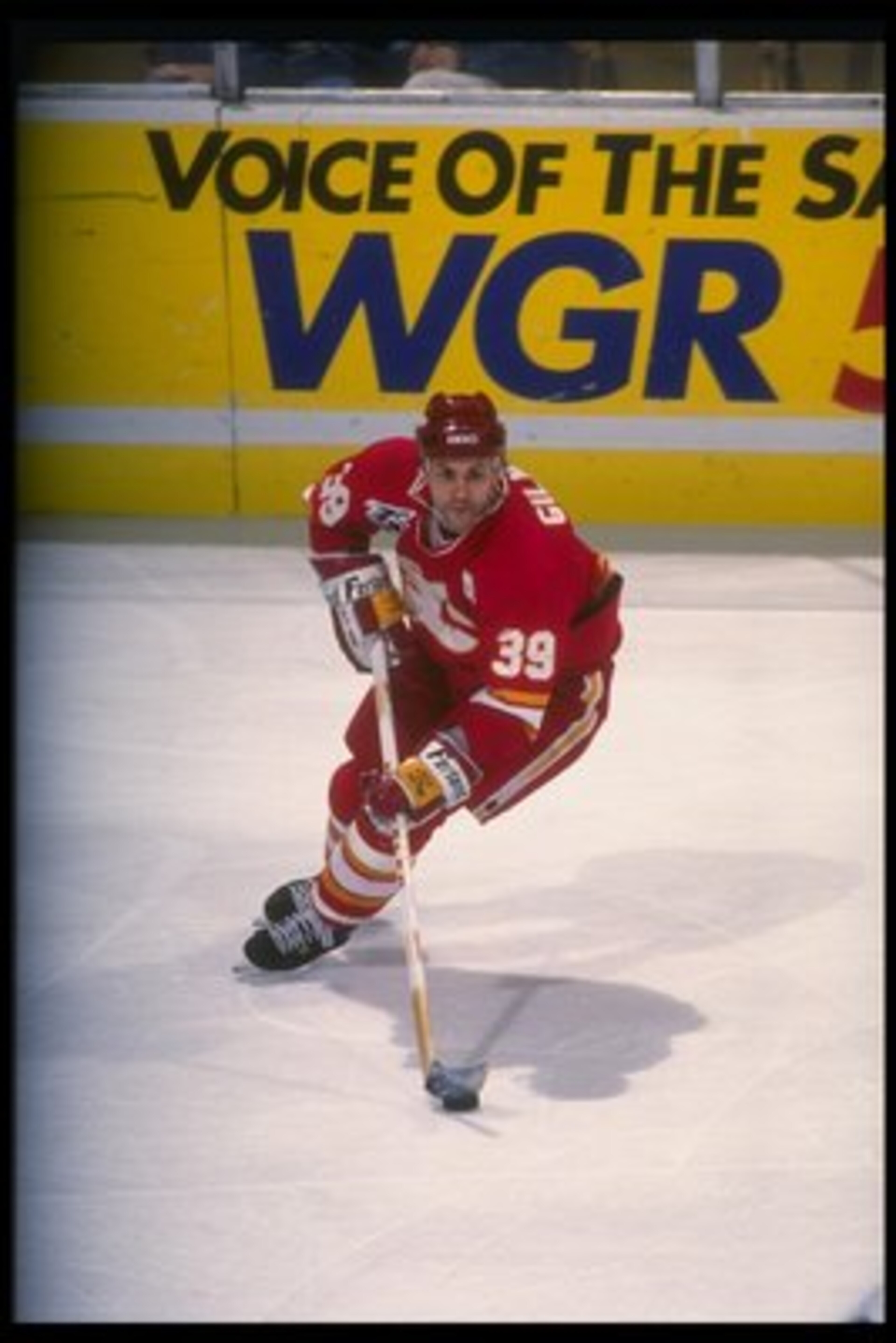 8 Dec 1991:  Center Doug Gilmour of the Calgary Flames moves the puck during a game againsst the Buffalo Sabres at Memorial Auditorium in Buffalo, New York. Mandatory Credit: Rick Stewart  /Allsport