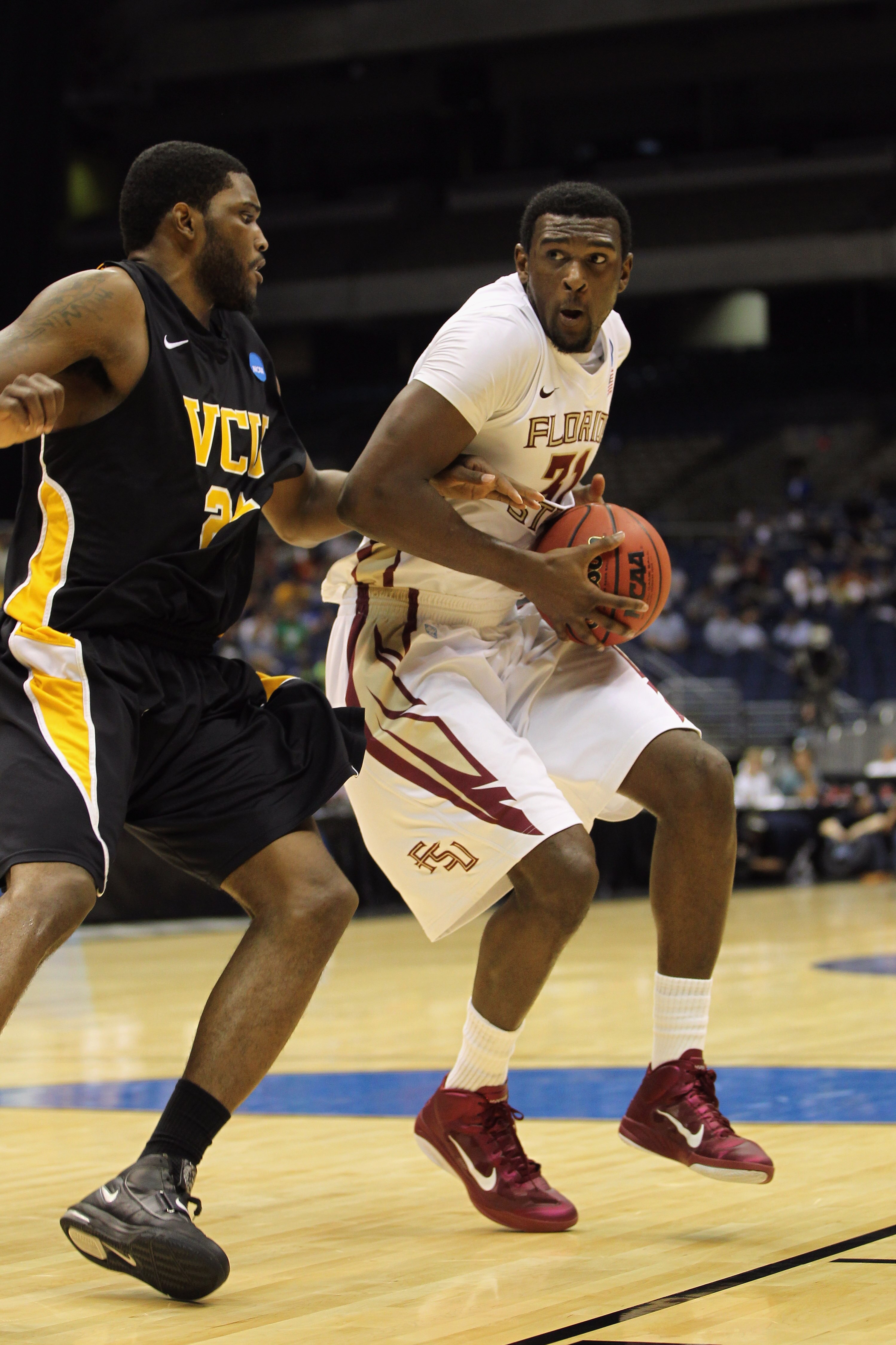 SAN ANTONIO, TX - MARCH 25: Chris Singleton #31 of the Florida State Seminoles handles the ball against Jamie Skeen #21 of the Virginia Commonwealth Rams during the southwest regional of the 2011 NCAA men's basketball tournament at the Alamodome on March SAN ANTONIO, TX - MARCH 25: Chris Singleton #31 of the Florida State Seminoles handles the ball against Jamie Skeen #21 of the Virginia Commonwealth Rams during the southwest regional of the 2011 NCAA men's basketball tournament at the Alamodome on March