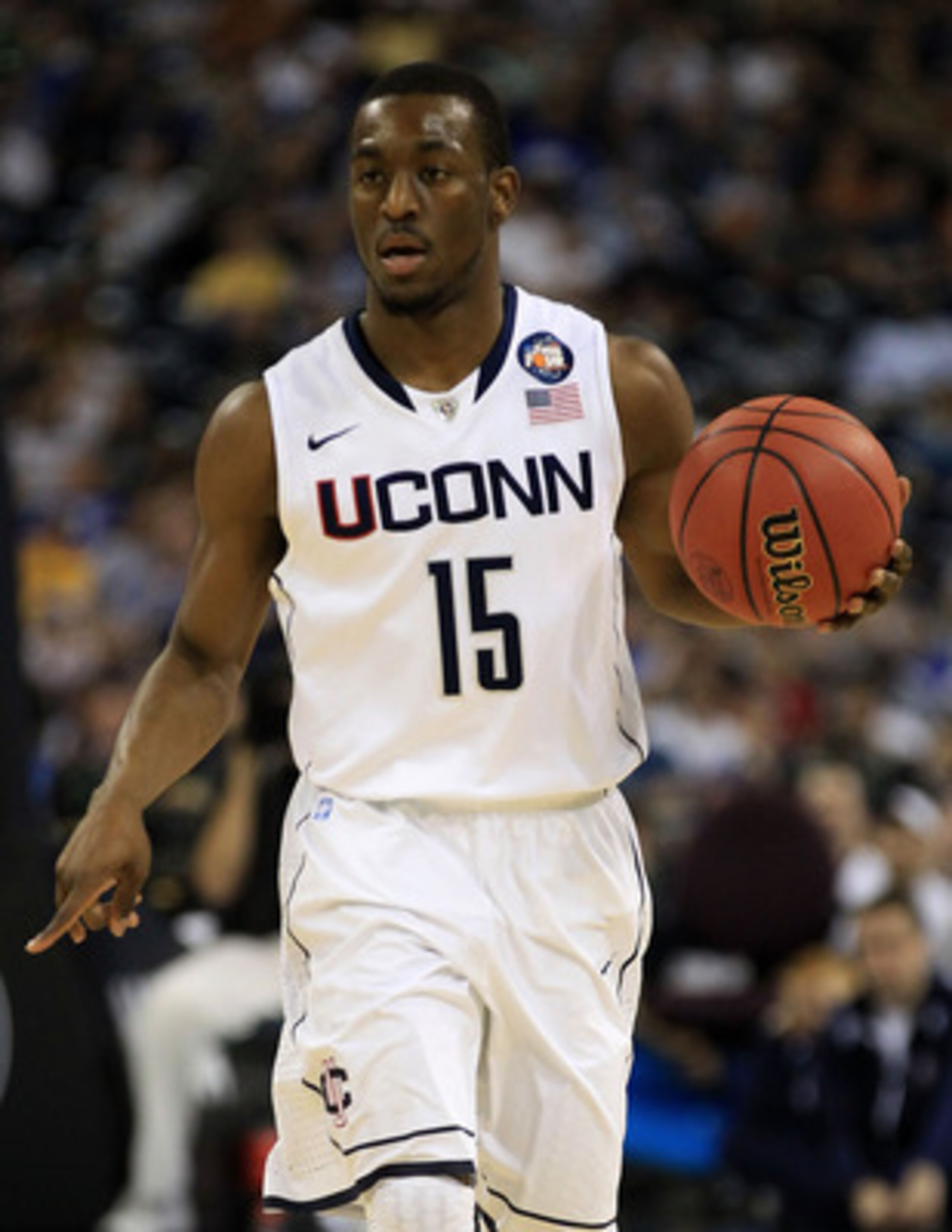 HOUSTON, TX - APRIL 02: Kemba Walker #15 of the Connecticut Huskies handles the ball against the Kentucky Wildcats during the National Semifinal game of the 2011 NCAA Division I Men's Basketball Championship at Reliant Stadium on April 2, 2011 in Houston HOUSTON, TX - APRIL 02: Kemba Walker #15 of the Connecticut Huskies handles the ball against the Kentucky Wildcats during the National Semifinal game of the 2011 NCAA Division I Men's Basketball Championship at Reliant Stadium on April 2, 2011 in Houston