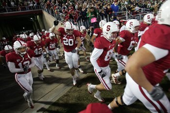 PALO ALTO, CA - NOVEMBER 28:  Clinton Snyder #20 and the rest of the Stanford Cardinal run out of the tunnel for their game against the Notre Dame Fighting Irish at Stanford Stadium on November 28, 2009 in Palo Alto, California.  (Photo by Ezra Shaw/Getty